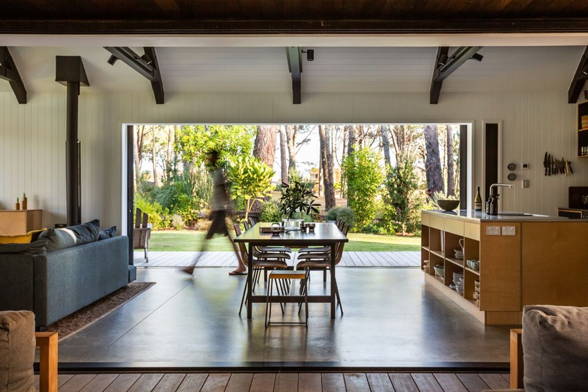 There is no formal front door or entrance to the house; more, a sense of meandering in from any of various possible points