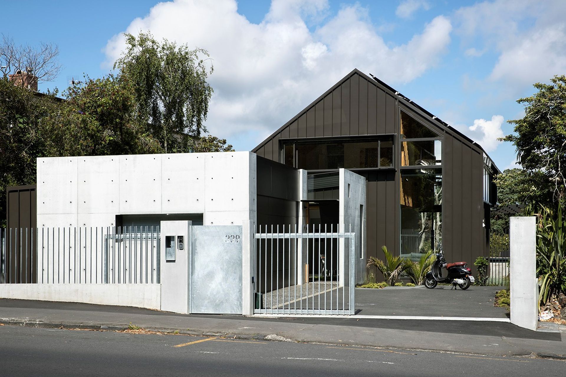 339 is situated on a busy road with constant diesel fumes, so utilises robust materials such as in-situ concrete, galvanised steel and easy wash-down Colorsteel cladding. By Strachan Group Architects. Photo by Simon Devitt.