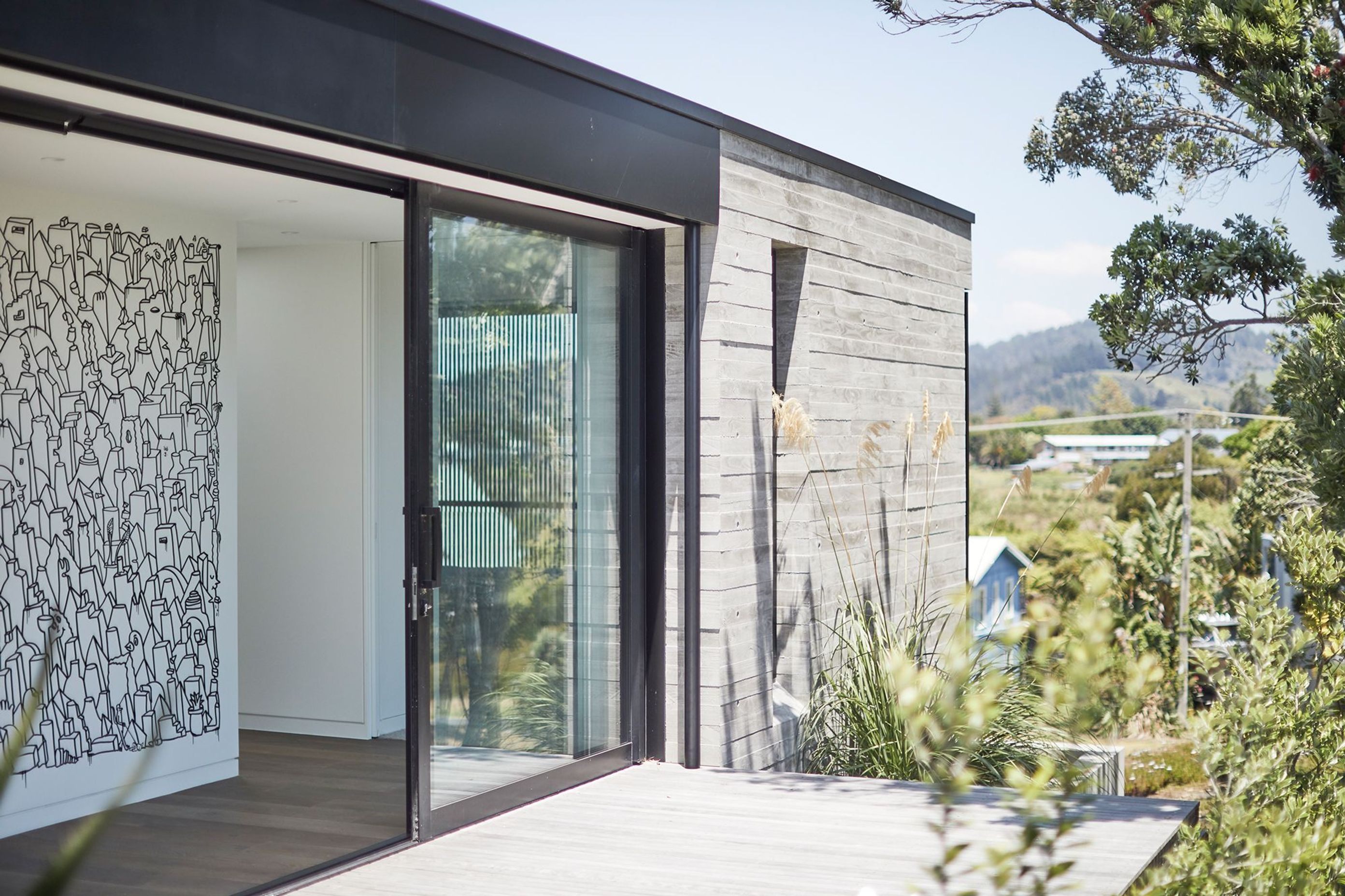 The exposed rough sawn finish is both an expression of the coarseness of the sand and a delineation between the ever-changing dunes and the permanence of the structure.