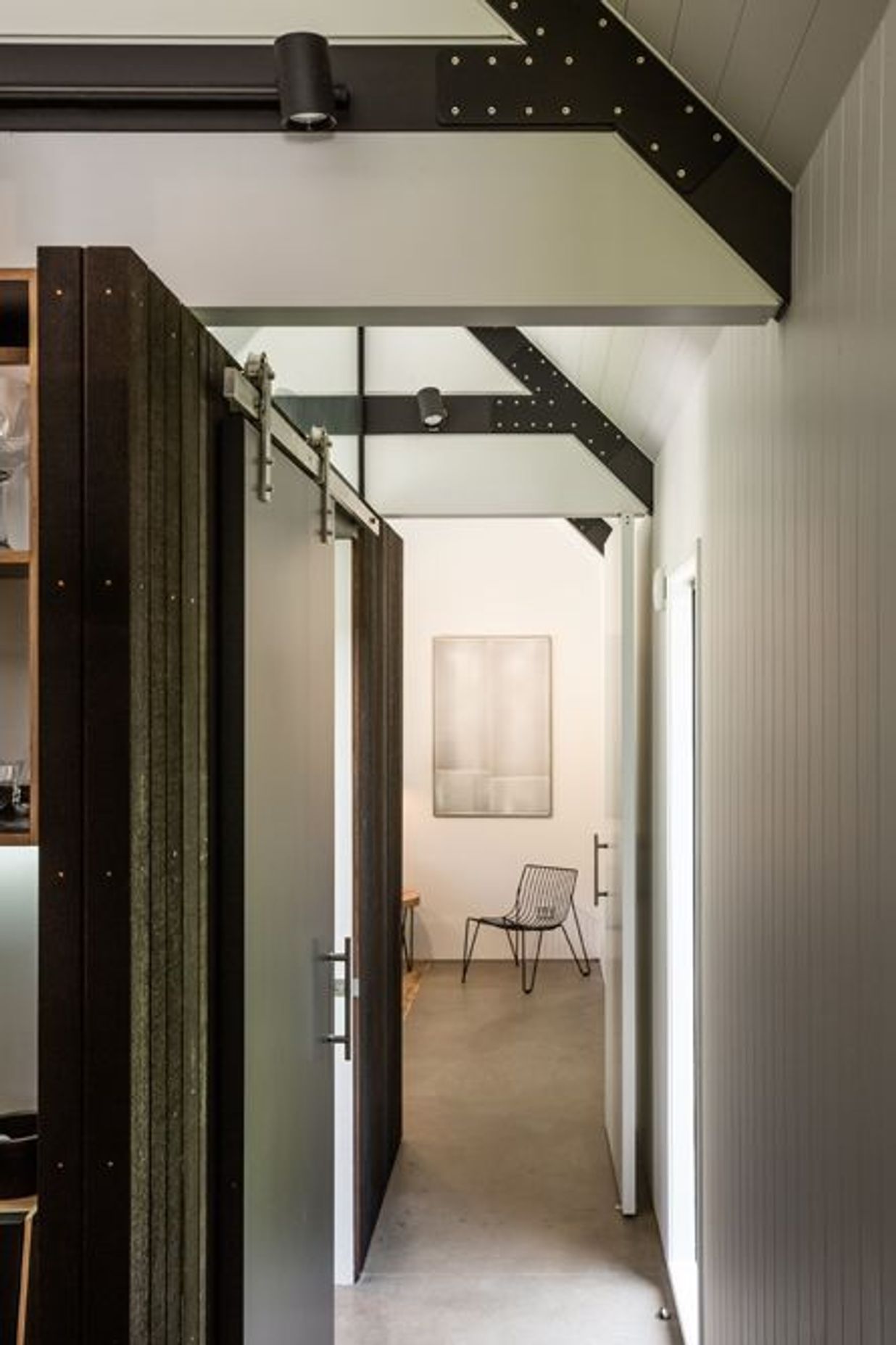 Timber and concrete combine to create a refined material palette.