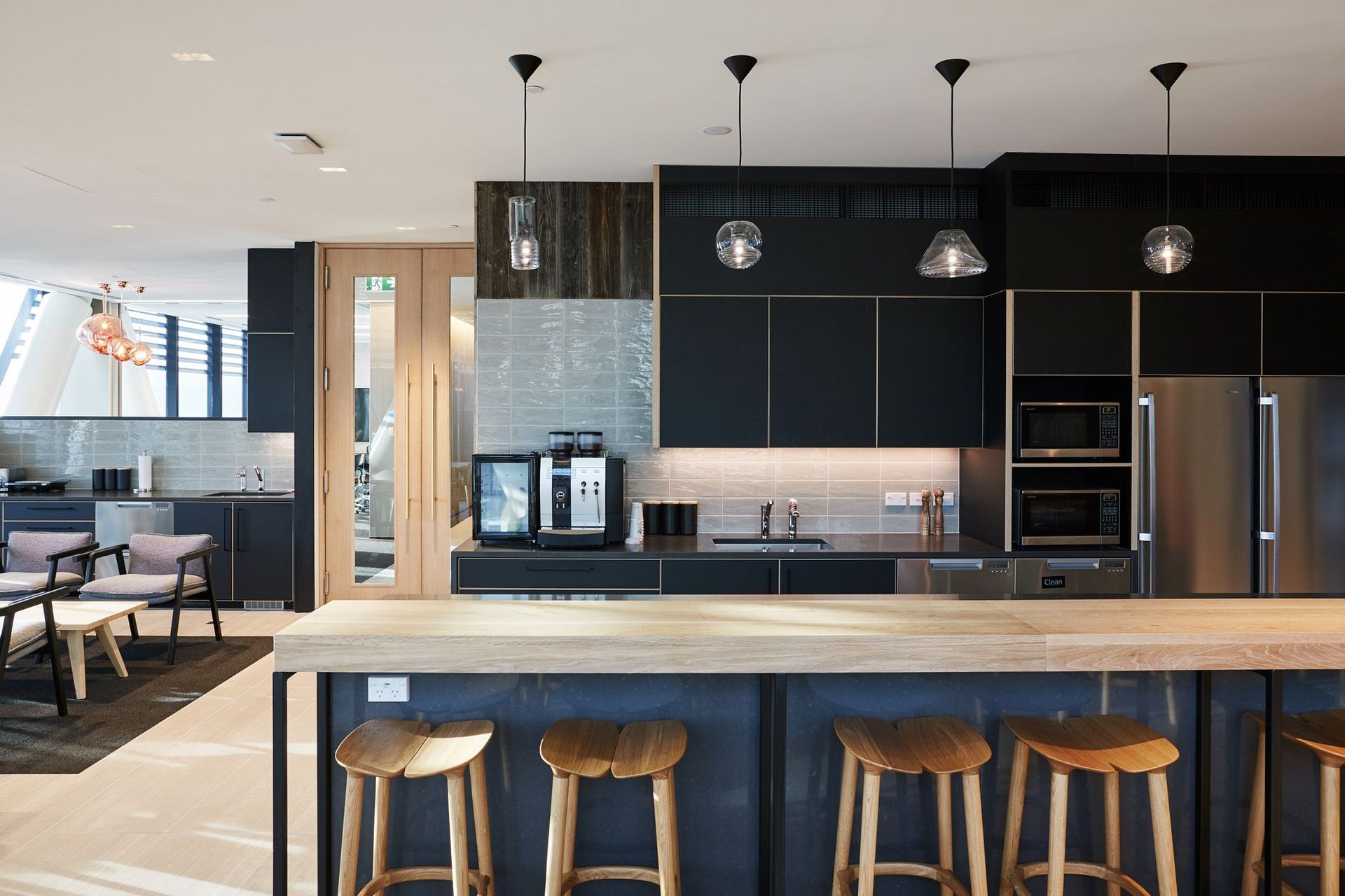 The staff café on the 12th floor is as nice as any café in town, featuring natural materials and views of the citiscape.