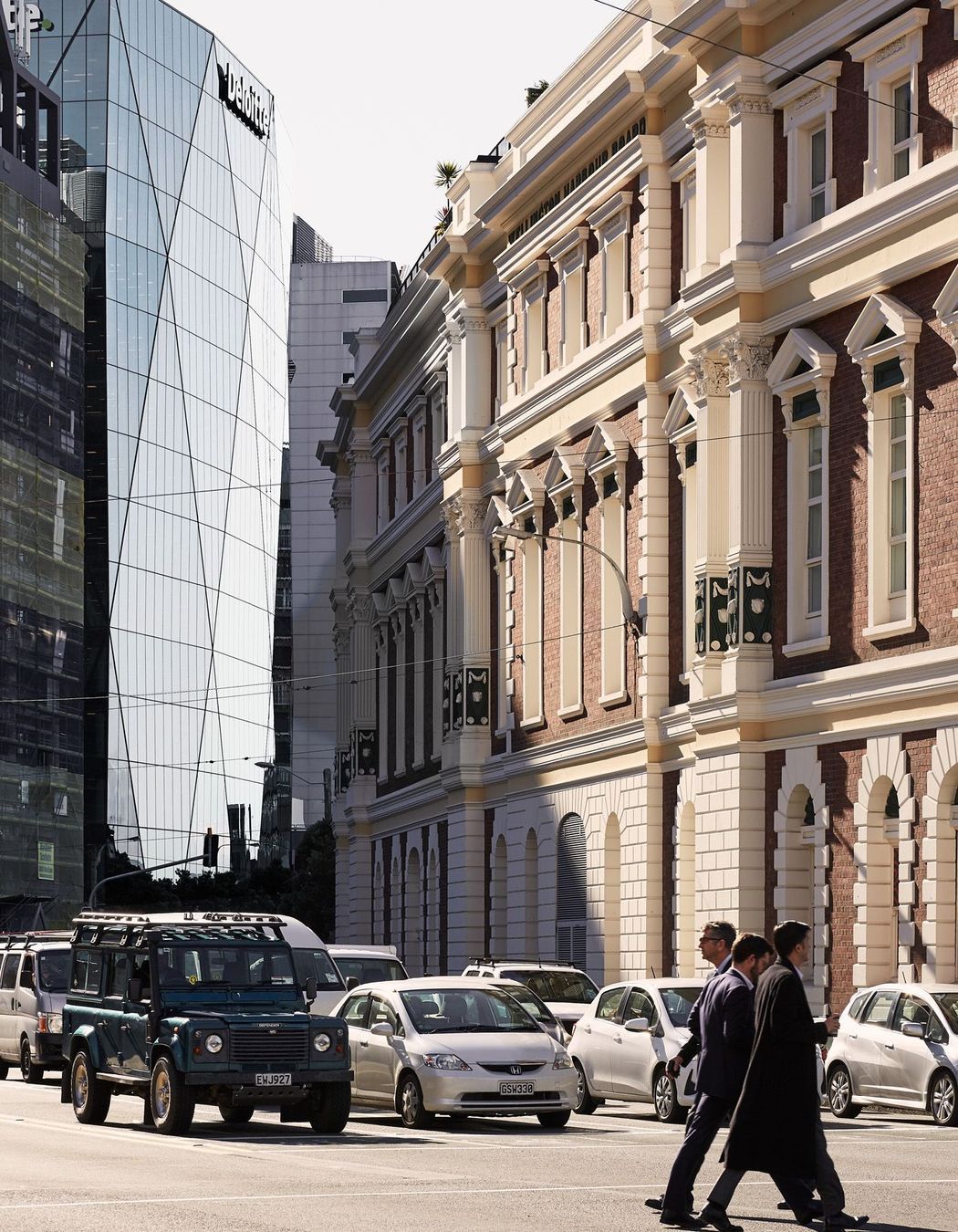 XXCQ sits within a landscape of commercial buildings.