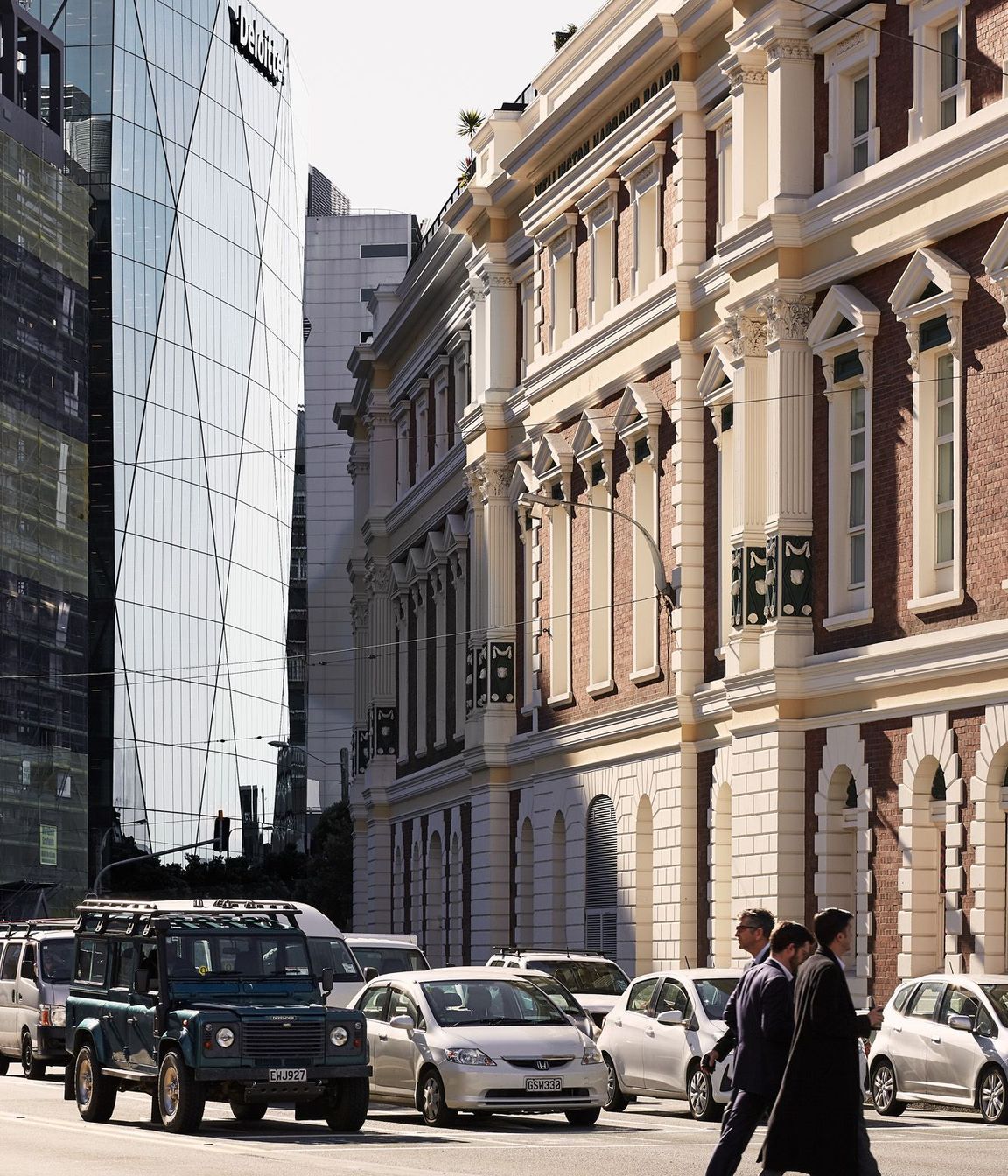 XXCQ sits within a landscape of commercial buildings.