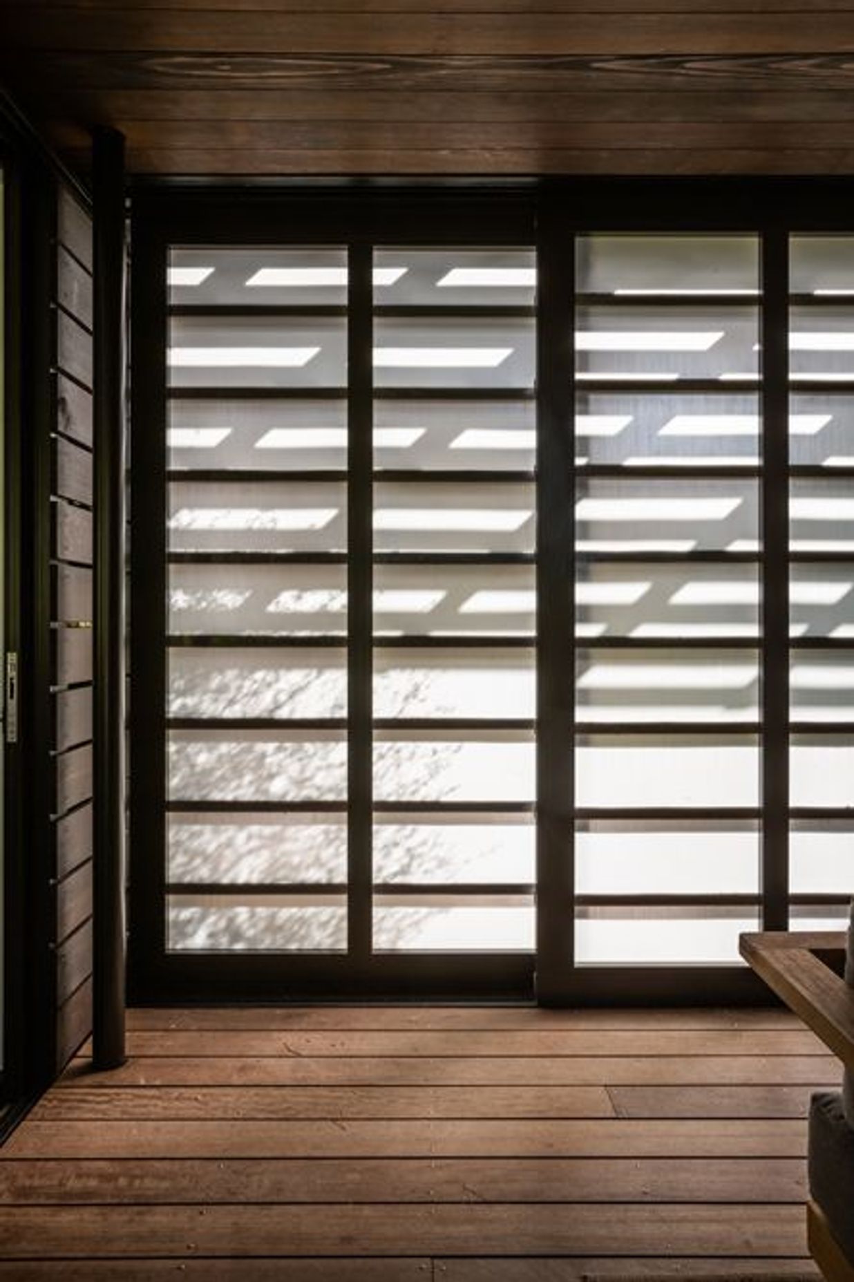 Light and shadow dance across the shoji screens. 