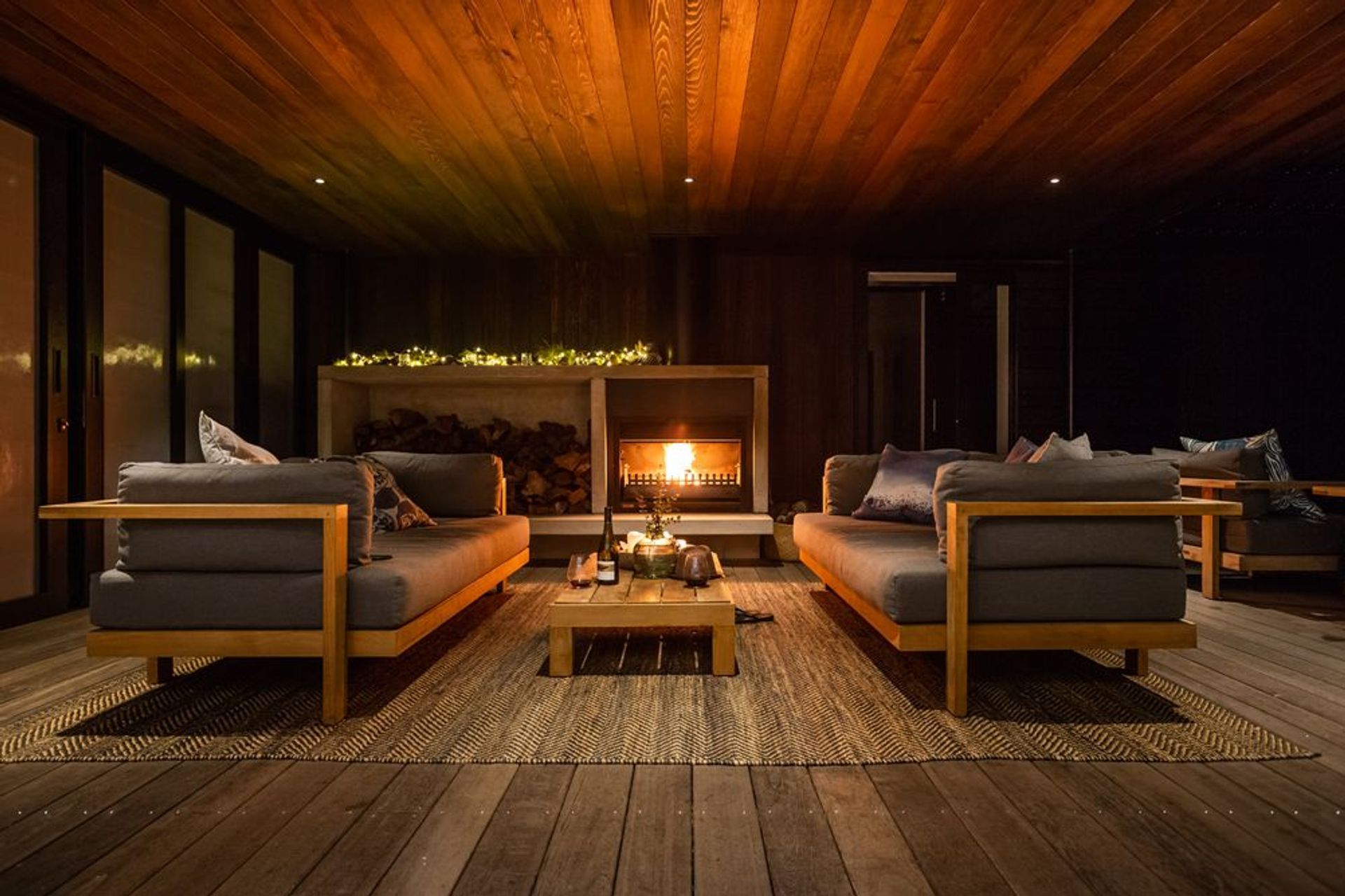 Heralded by the outdoor fire, this sheltered courtyard provides the perfect place for year-round entertaining.