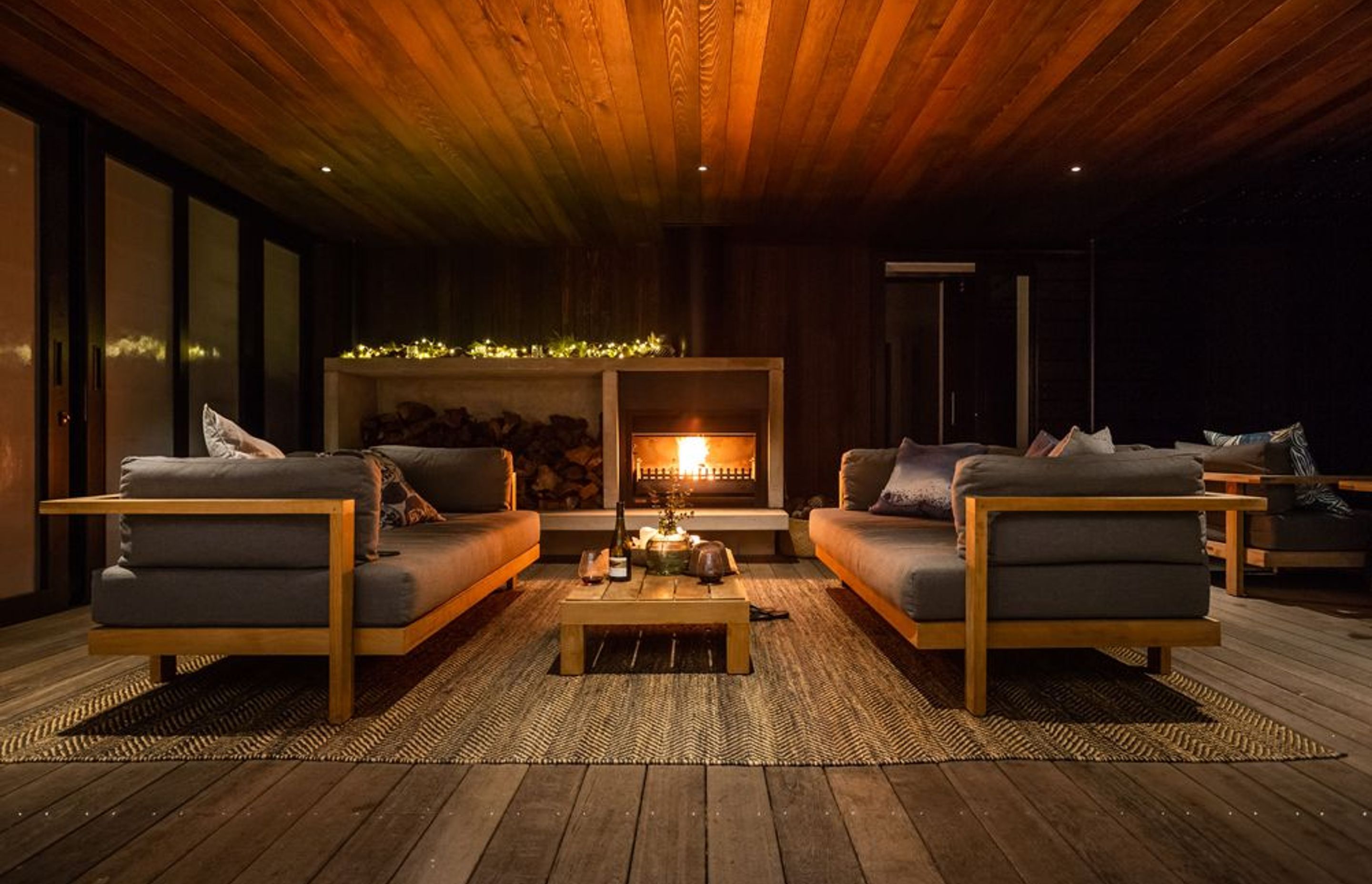 Heralded by the outdoor fire, this sheltered courtyard provides the perfect place for year-round entertaining.