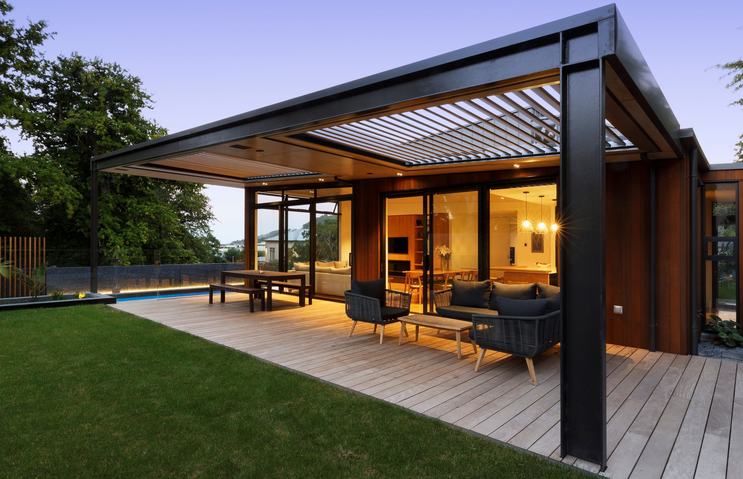 The west facing patio captures evening sun, and is sheltered with an operable louvred roof.