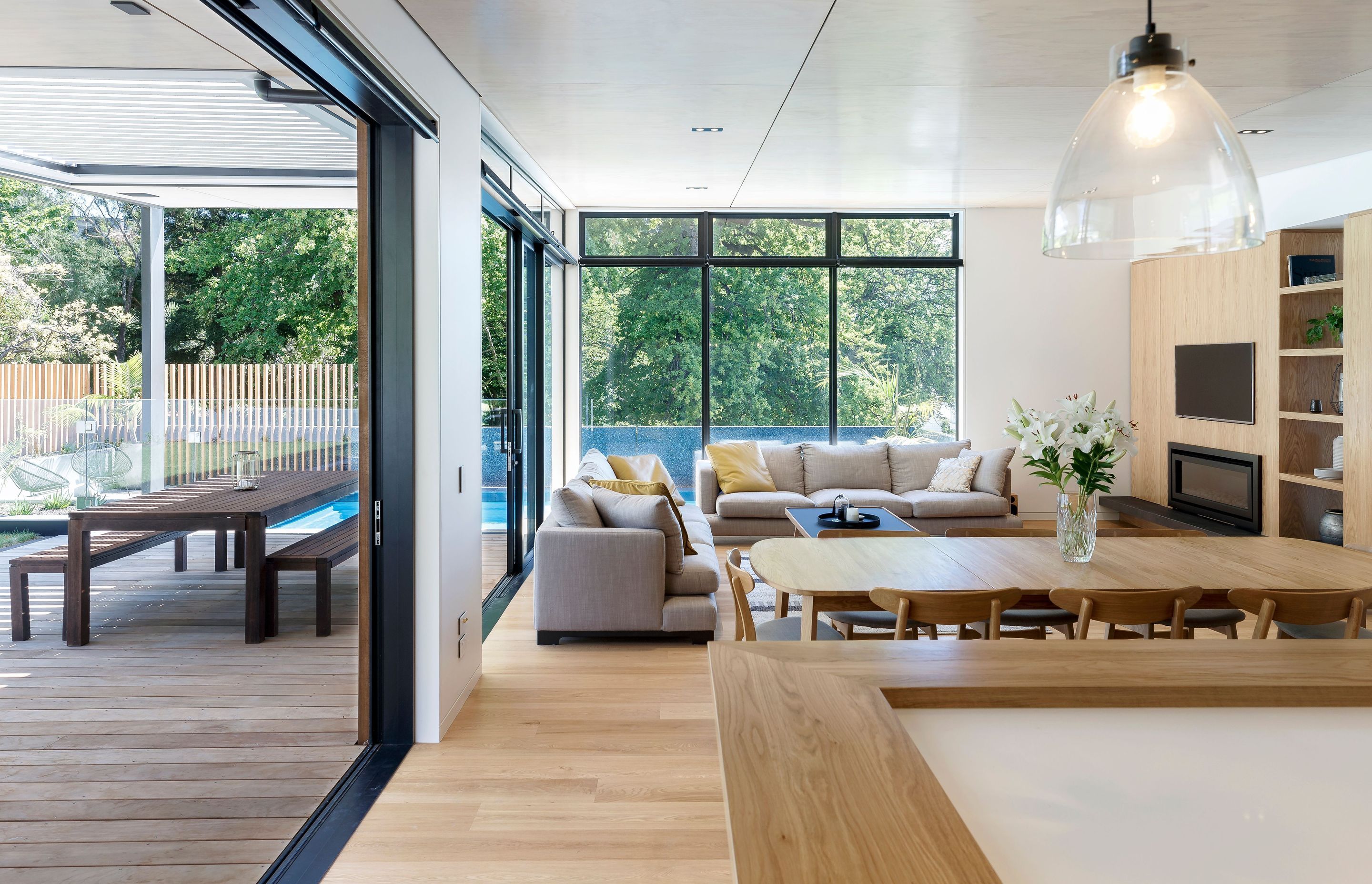 The lounge and outdoor dining area viewed from the kitchen.