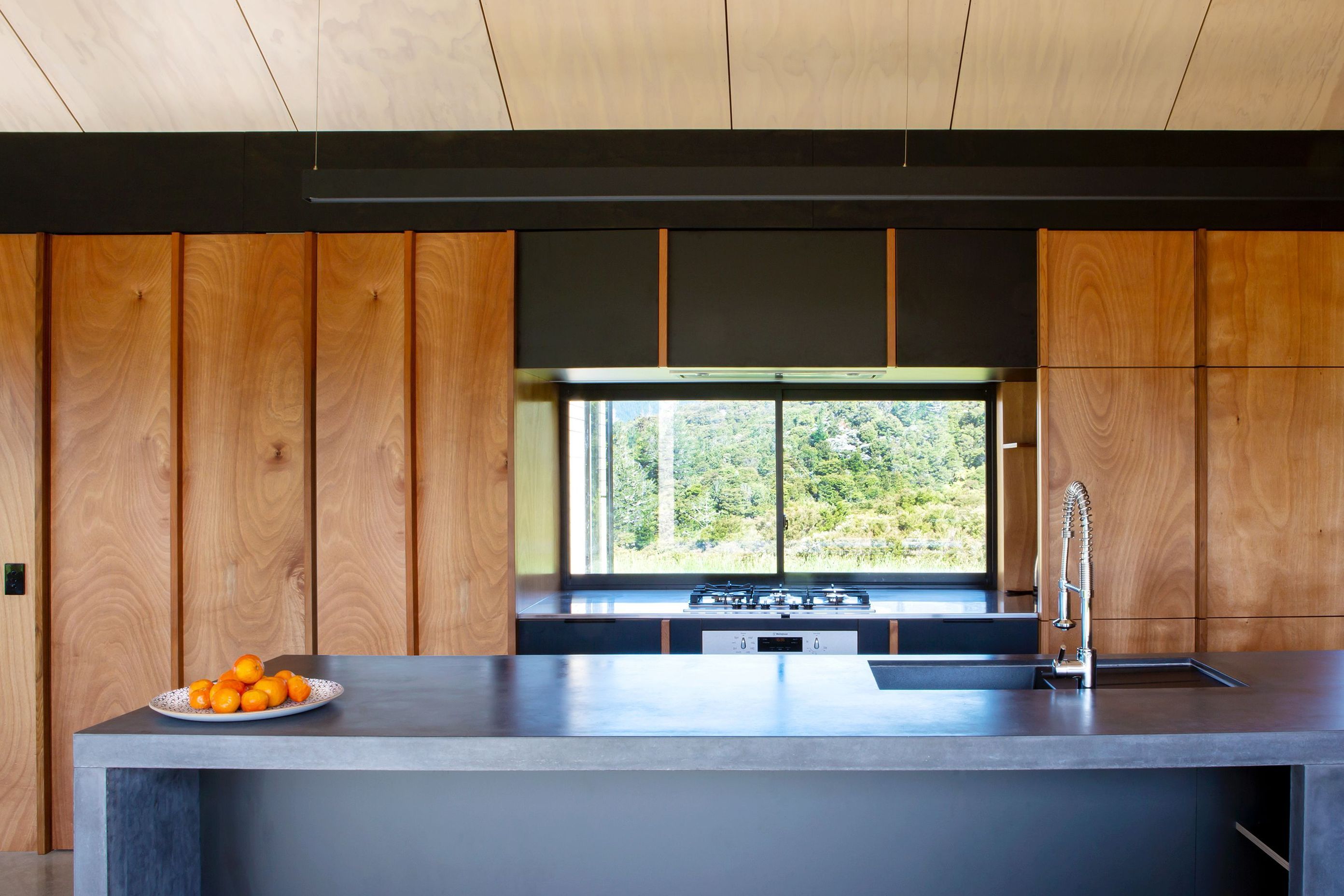 Simple functionality and natural, durable materials were specified for the kitchen. 