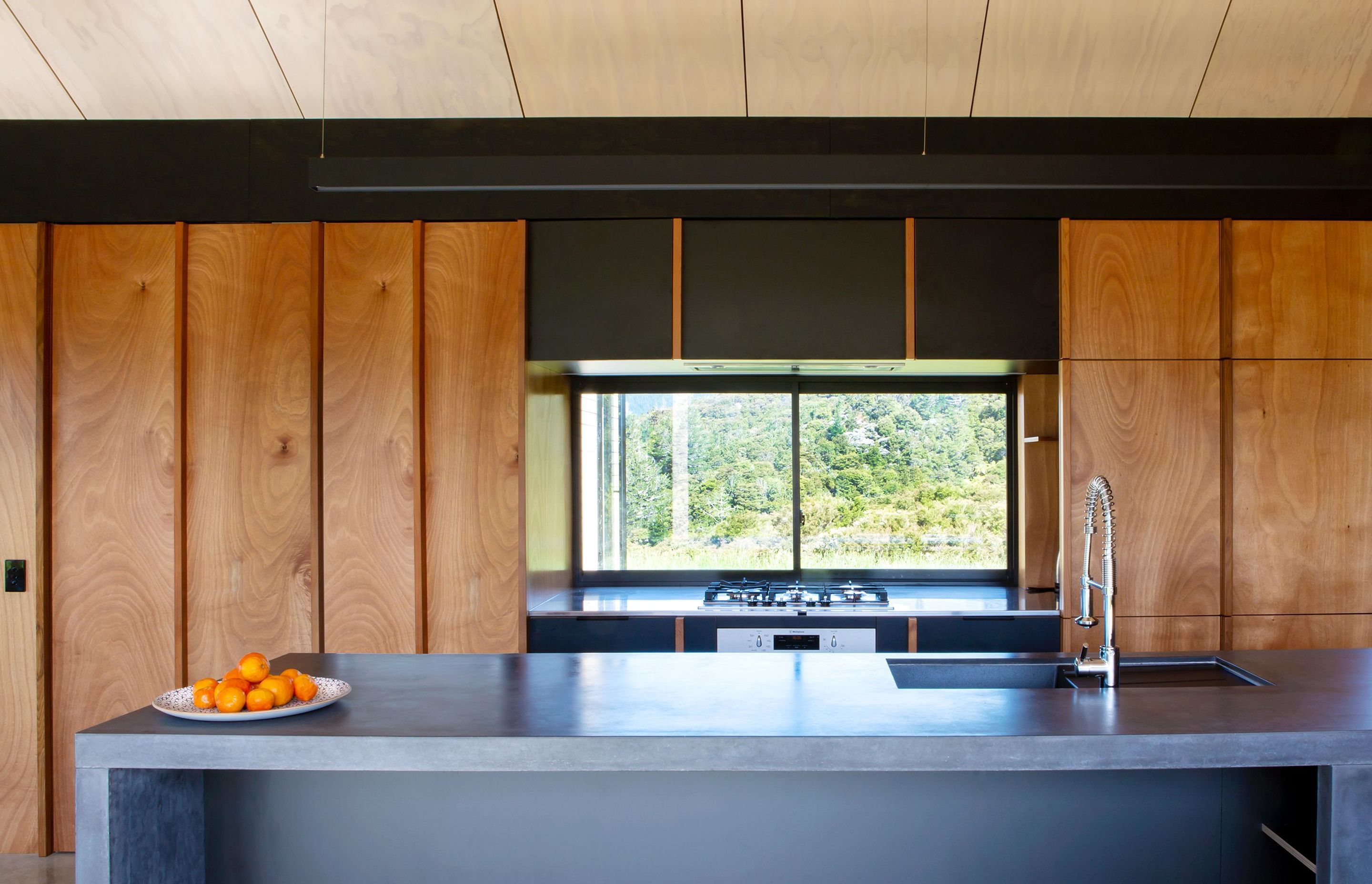 Simple functionality and natural, durable materials were specified for the kitchen. 