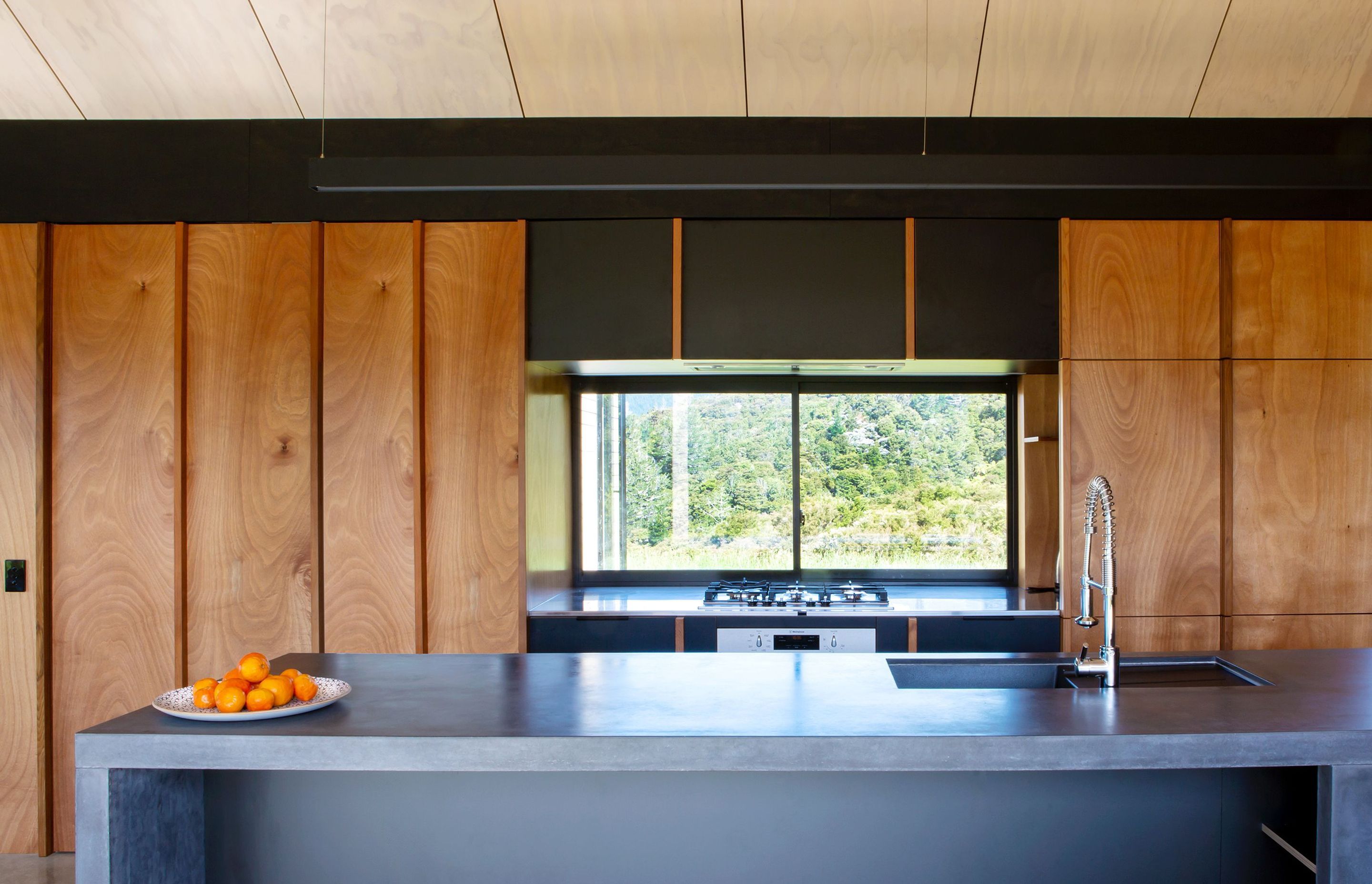 Simple functionality and natural, durable materials were specified for the kitchen.