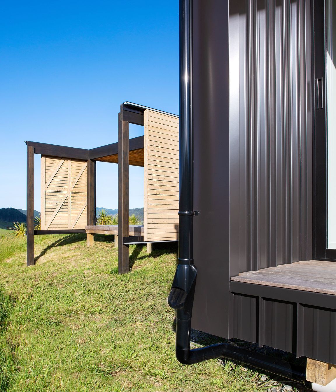 The barn-style doors allow for protection from sun and the elements.
