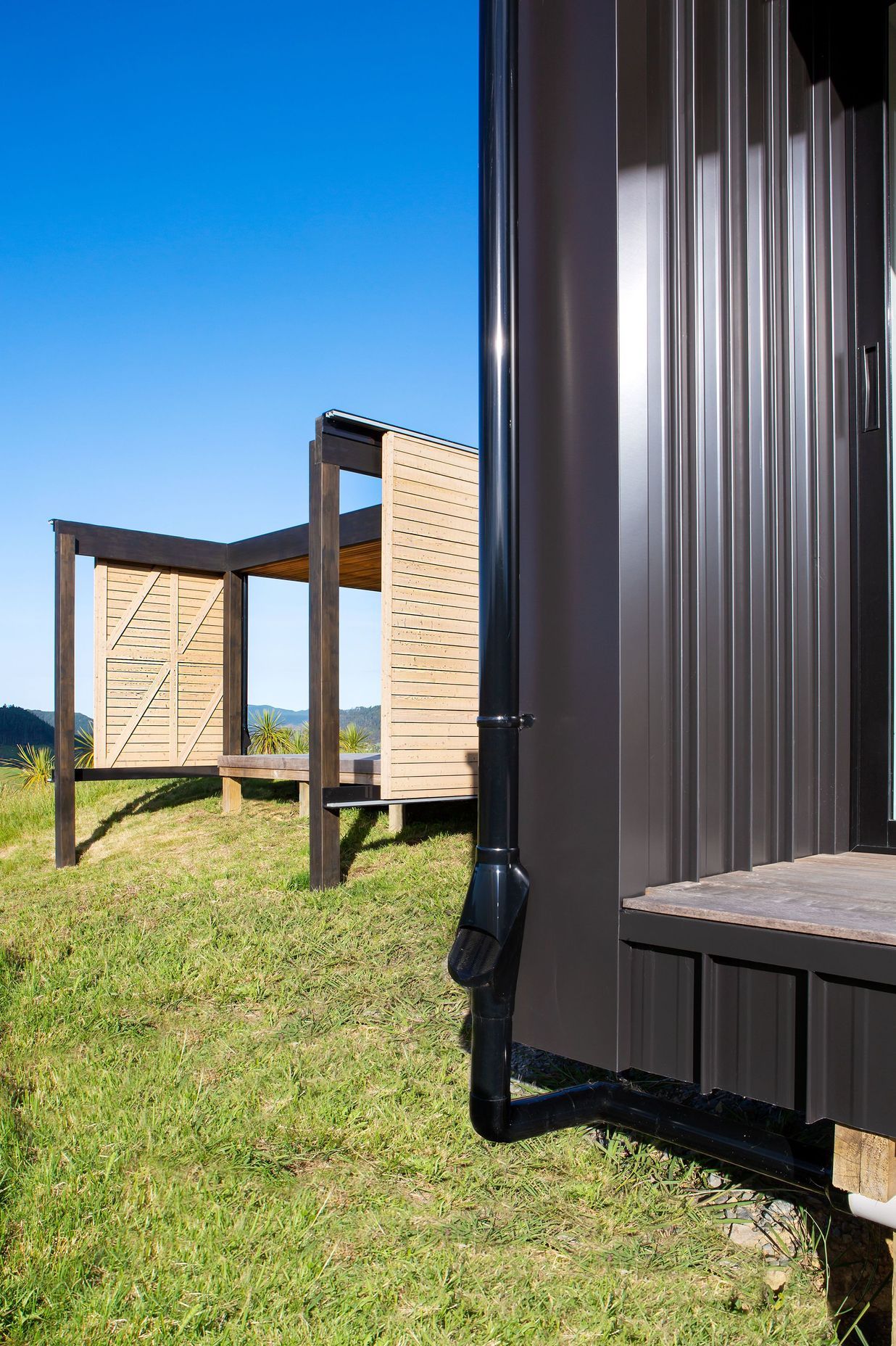 The barn-style doors allow for protection from sun and the elements.