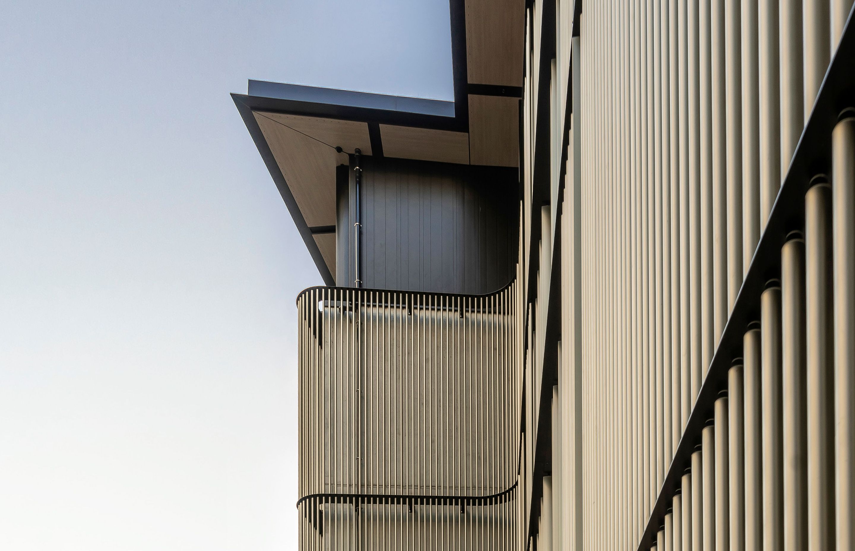 Oversized timber eaves offer a nod to a more residential vernacular.