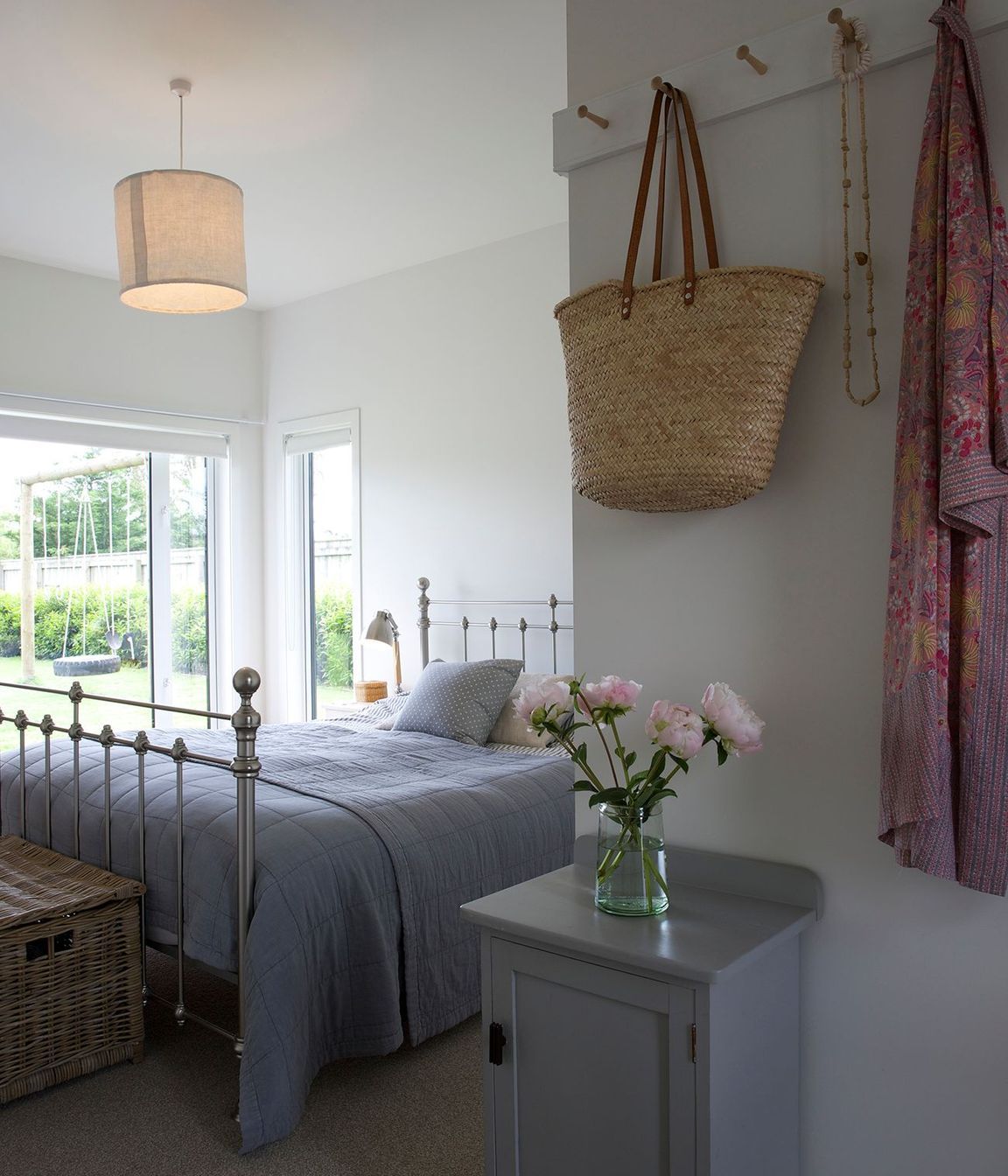 The master bedroom continues the natural palette of colours and materials.