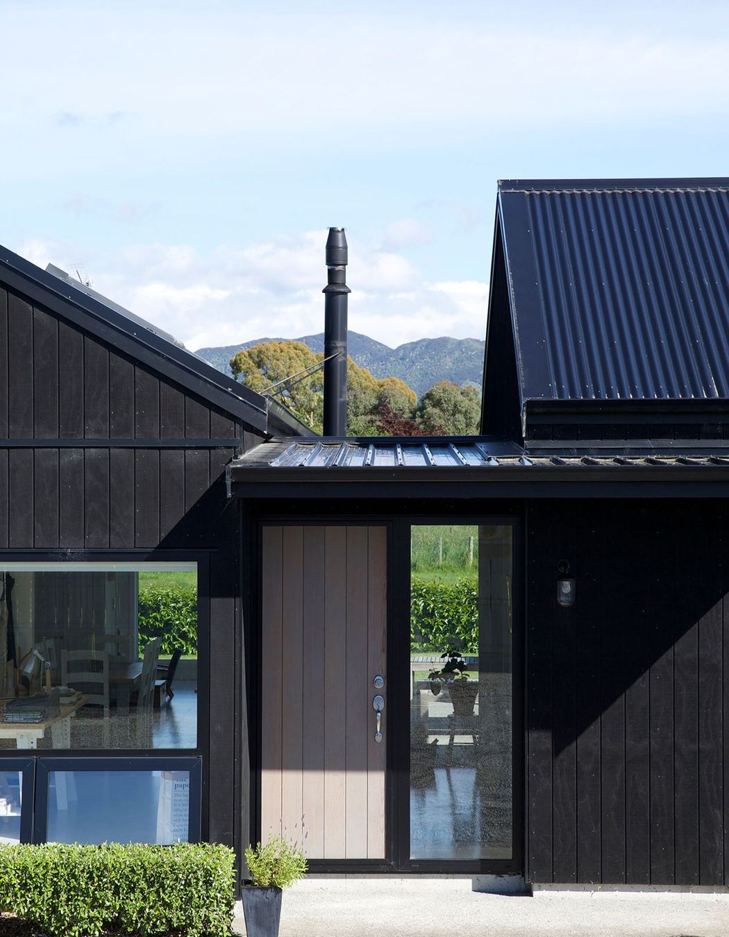 The main entry looks straight through to a view of the Tararua Ranges.
