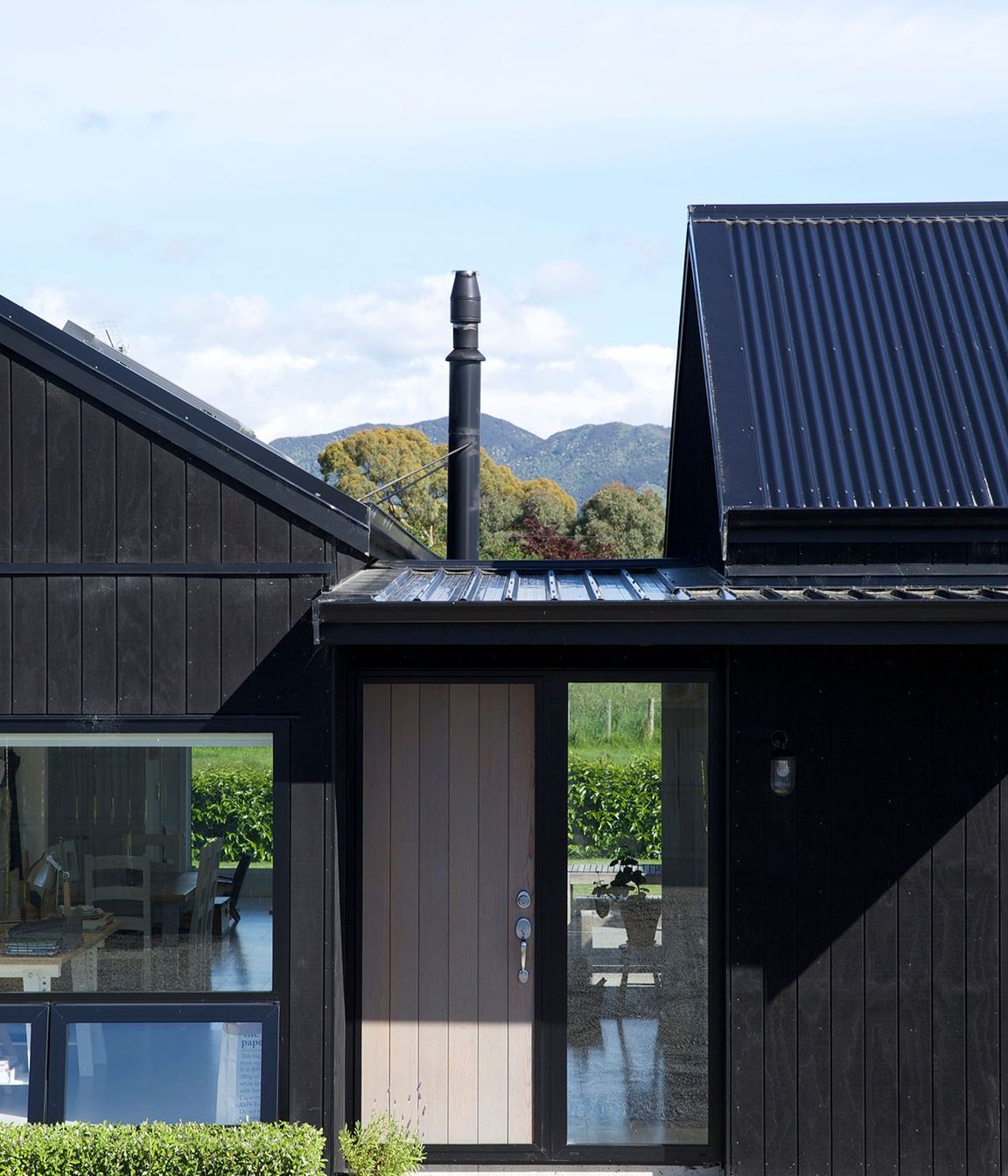 The main entry looks straight through to a view of the Tararua Ranges.