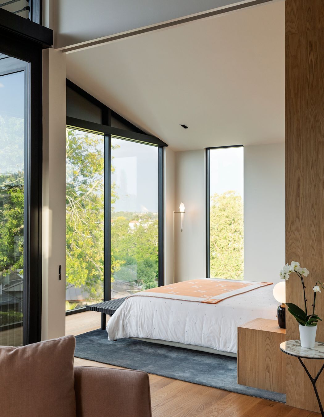 The upper-level study and master bedroom enjoys views of neighbouring treetops.