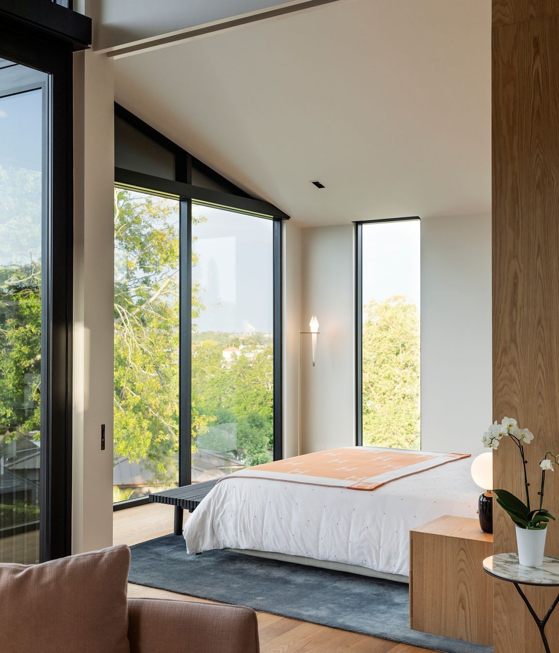The upper-level study and master bedroom enjoys views of neighbouring treetops.