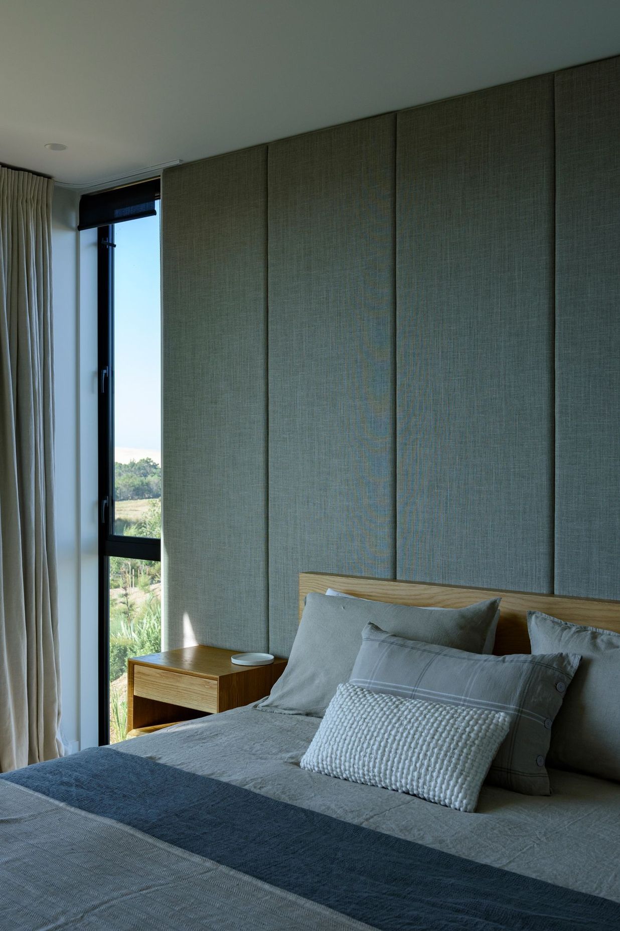 Floor to ceiling windows in the bedrooms ensure a connection with the surrounds is maintained in all areas of the house.