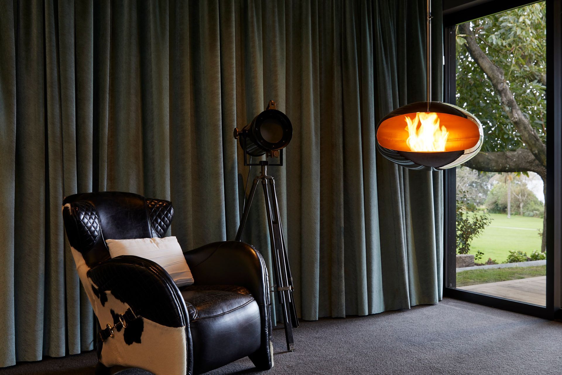 Even the fireplace in the media room appears to hang in mid air.