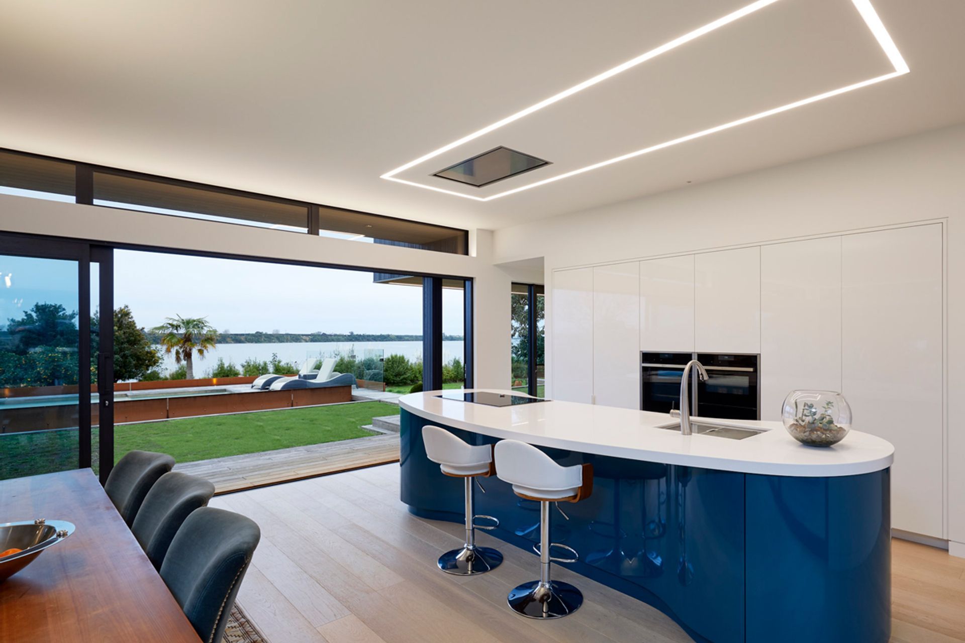 From the award winning state of the art European styled kitchen (built by Mastercraft Kitchens) to the glass clad entry door with custom LED lighting in the handle to the lighting up the staircase recessed into the handrails (lighting by Liv Light) this h