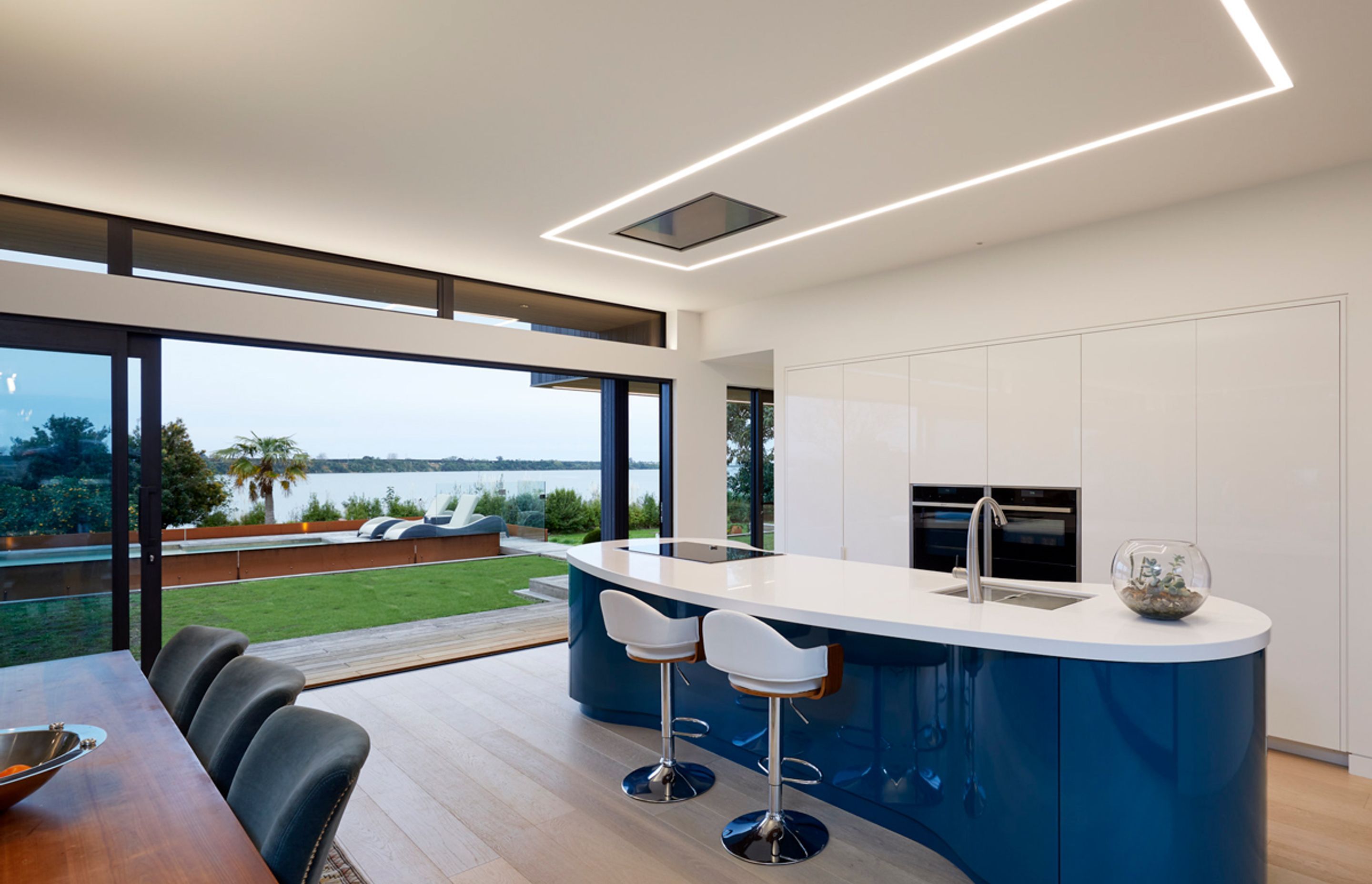 From the award winning state of the art European styled kitchen (built by Mastercraft Kitchens) to the glass clad entry door with custom LED lighting in the handle to the lighting up the staircase recessed into the handrails (lighting by Liv Light) this h