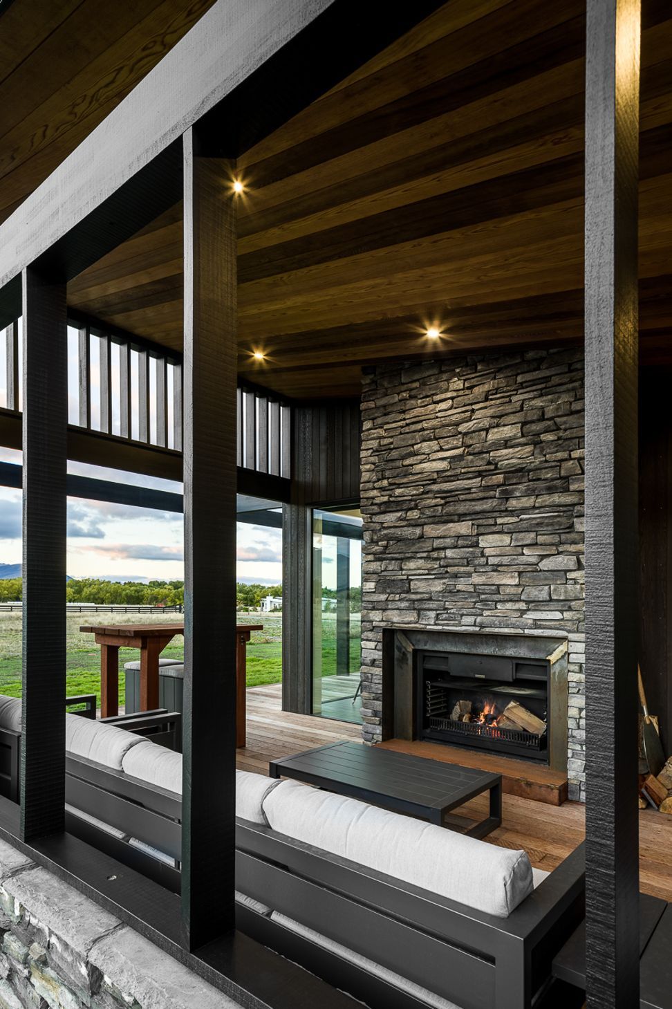 The evening terrace is centred around the outdoor pizza fire and is sheltered enough to feel cosy in winter but open enough to soak in the sunset views.