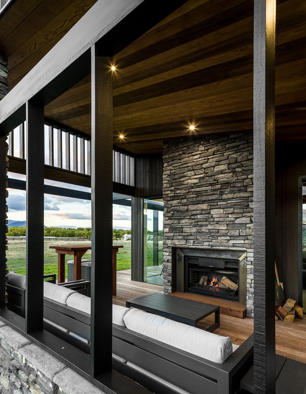The evening terrace is centred around the outdoor pizza fire and is sheltered enough to feel cosy in winter but open enough to soak in the sunset views.