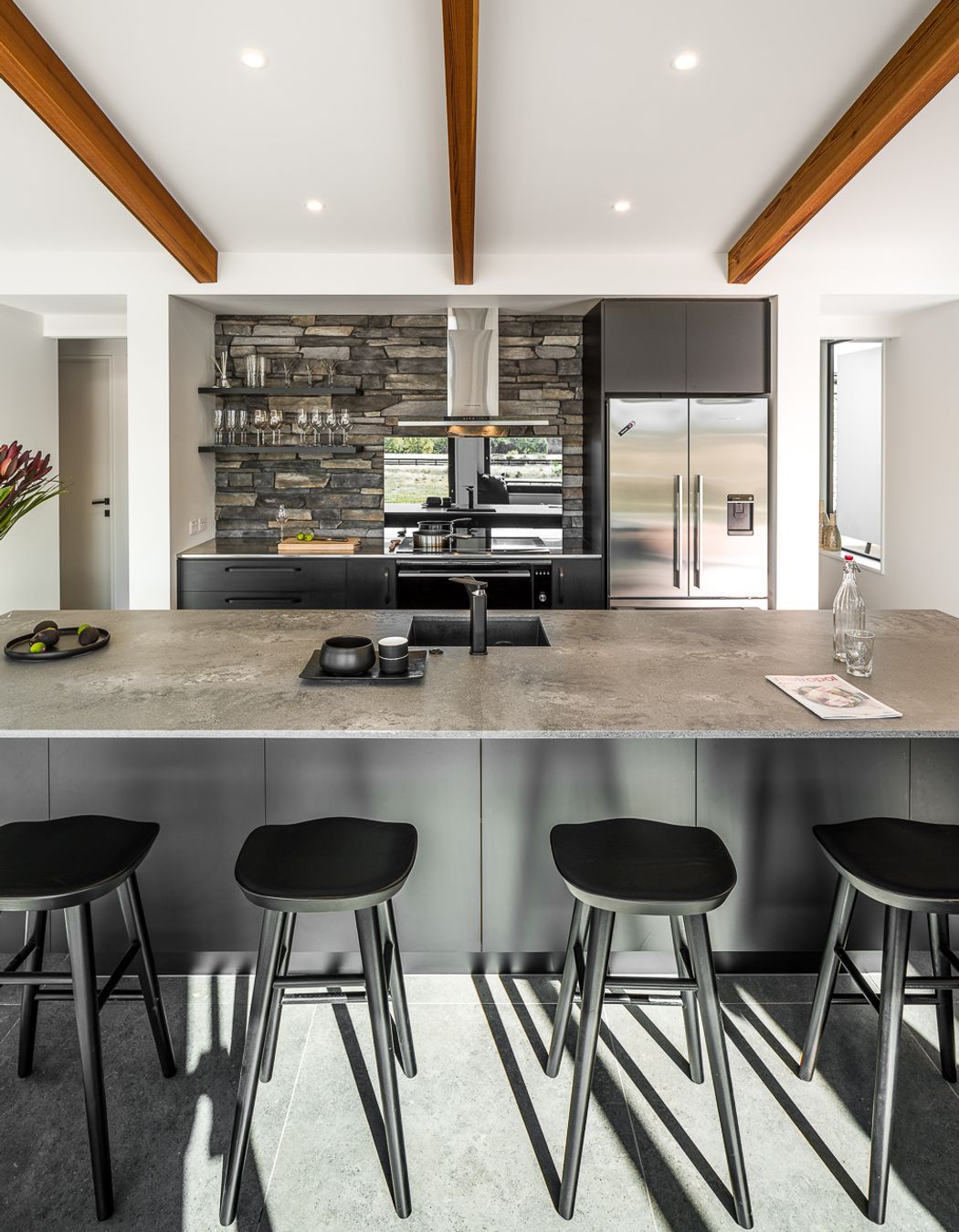 The same stone veneer features on the the kitchen backsplash.