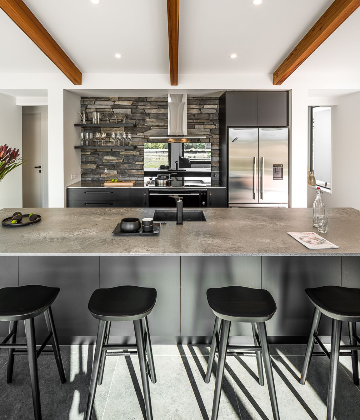 The same stone veneer features on the the kitchen backsplash.