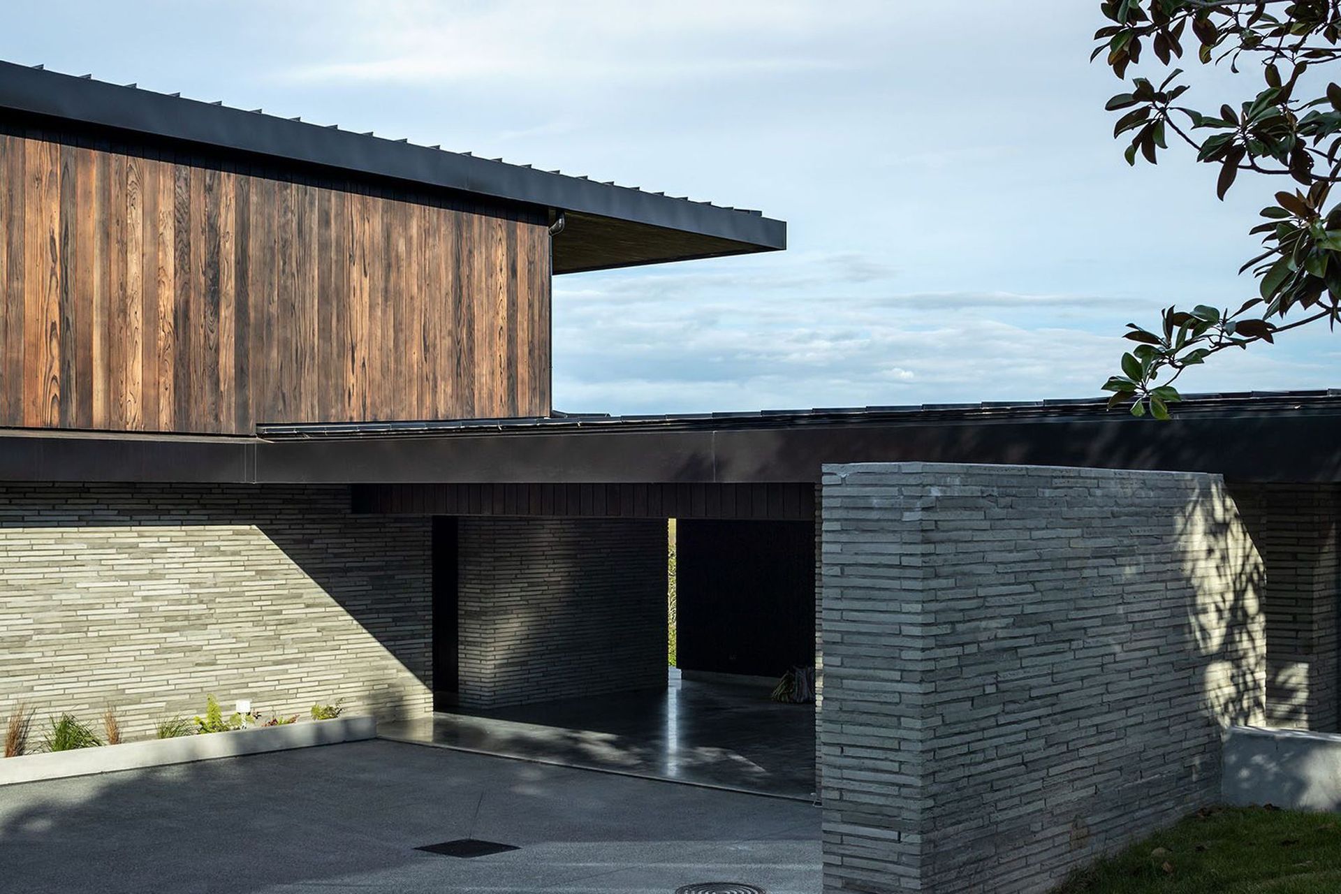 The lower levels are settled into the land, which is reflected in materiality with the use of handmade Petersen bricks.