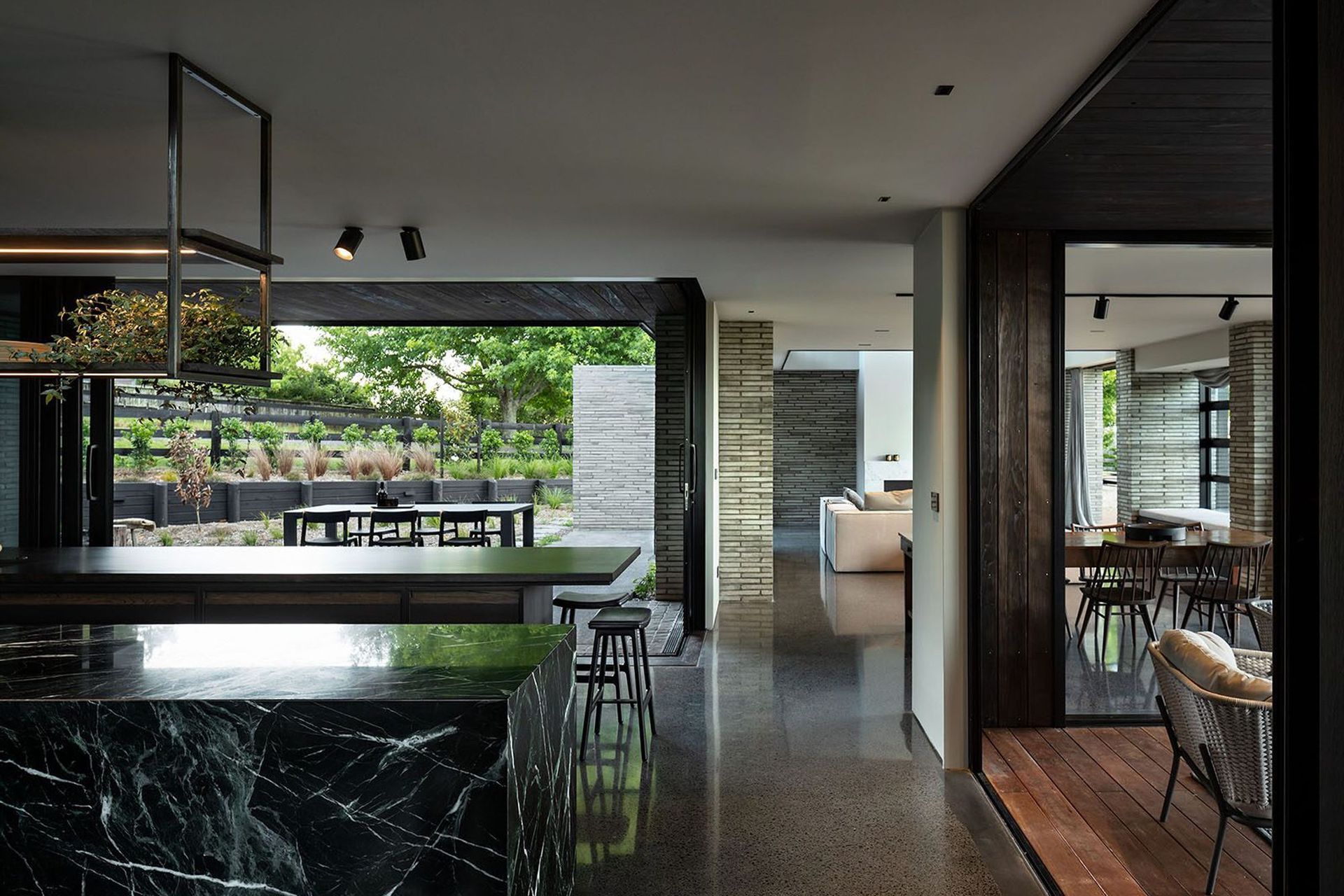 The green and blue hues of the marble form of one of the benchtops echo the colours of the rural valley and coastal surrounds. 