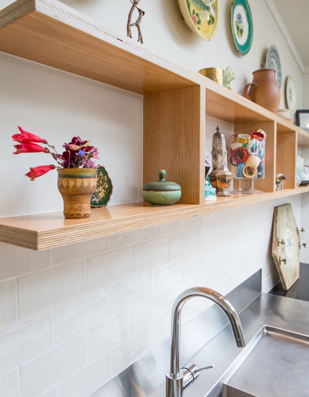 Open plywood shelving.