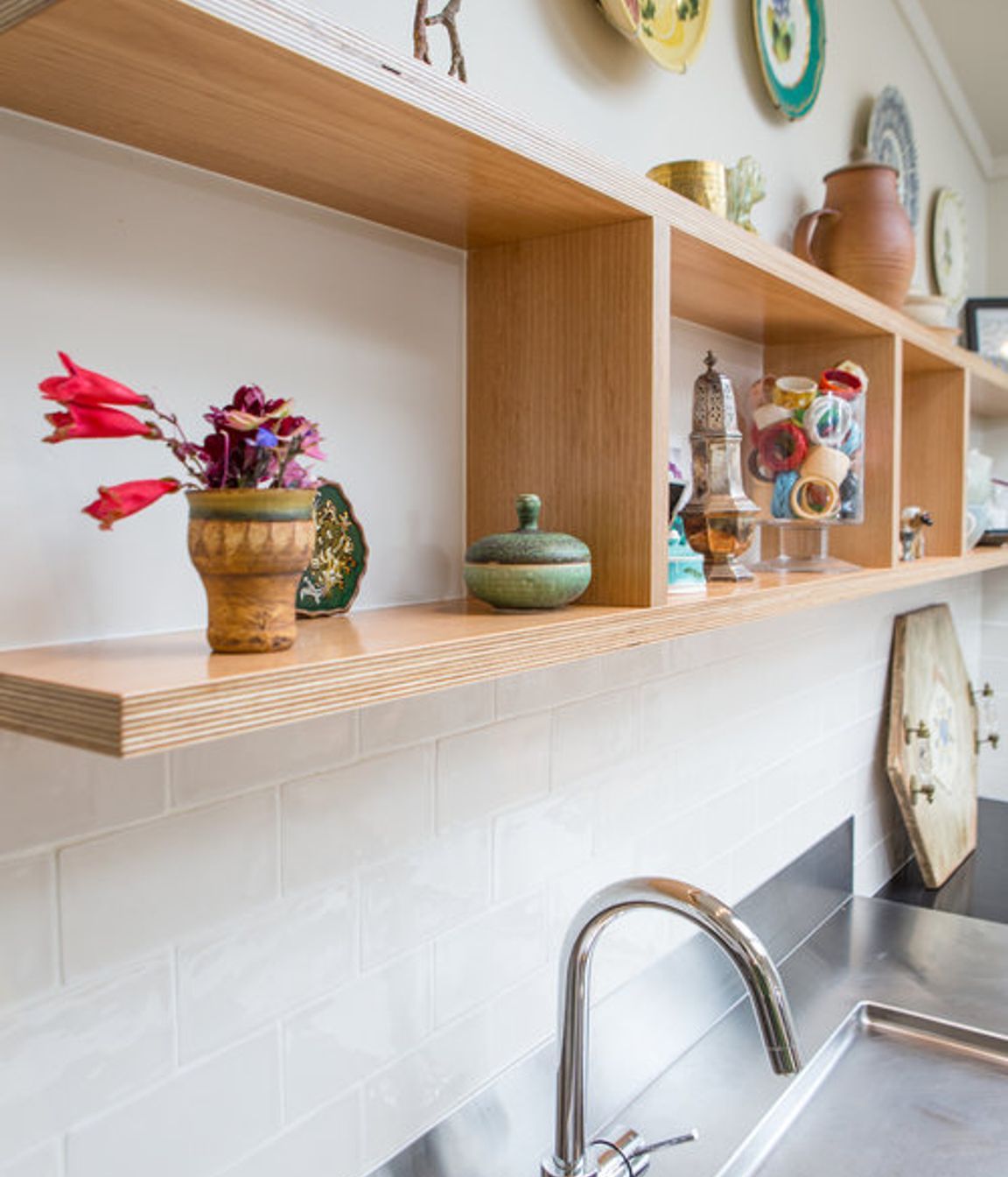Open plywood shelving.
