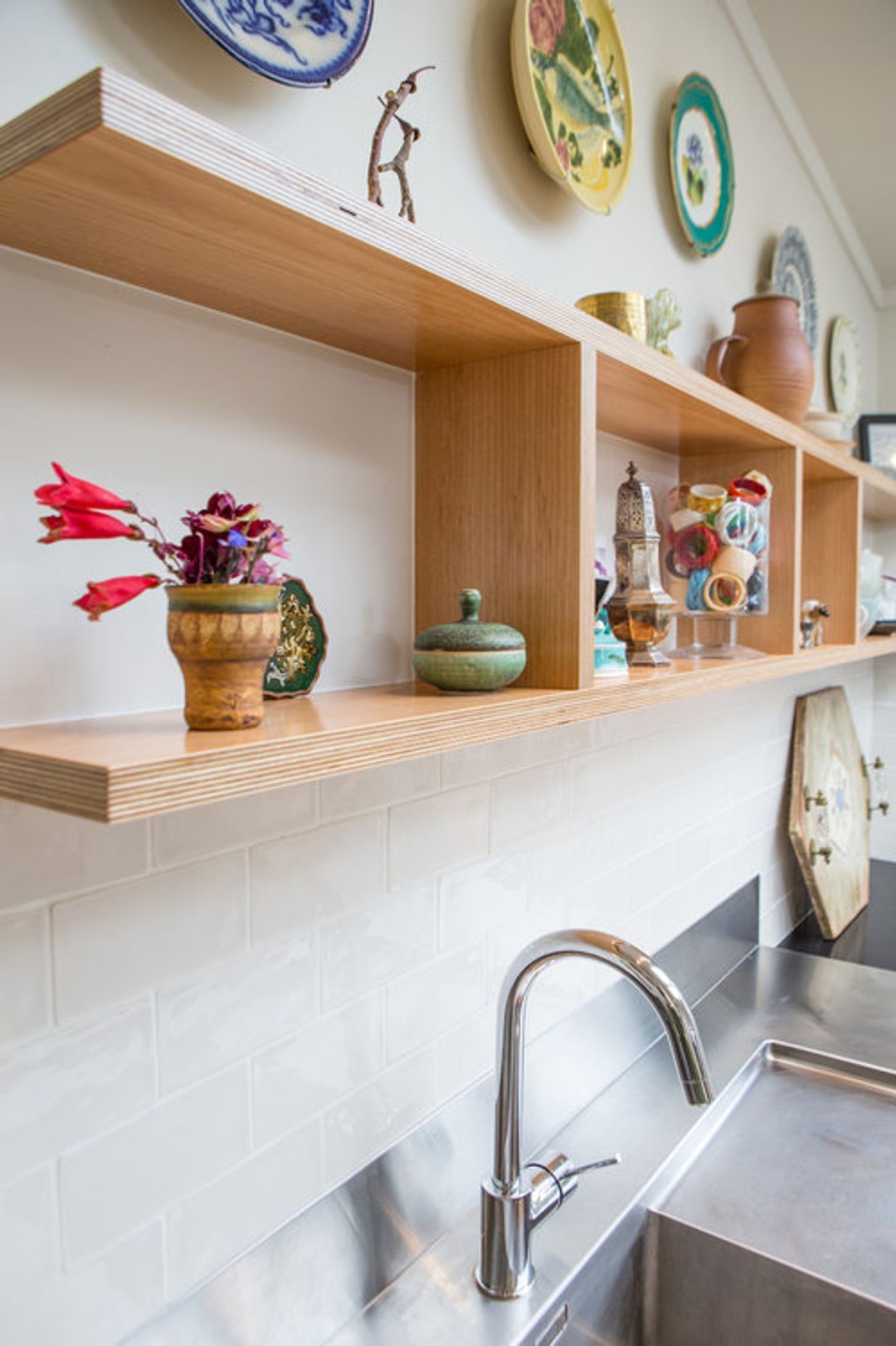 Open plywood shelving.