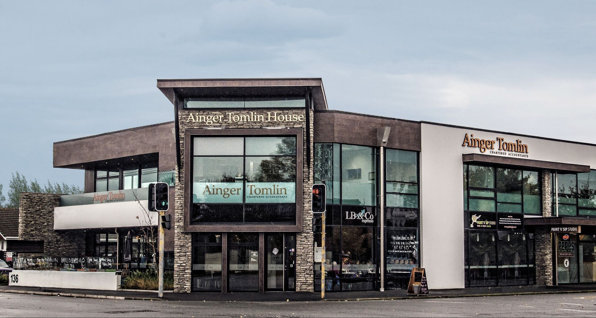 Ainger Tomlin House banner