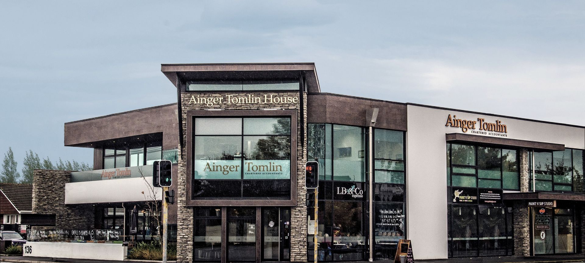 Ainger Tomlin House banner