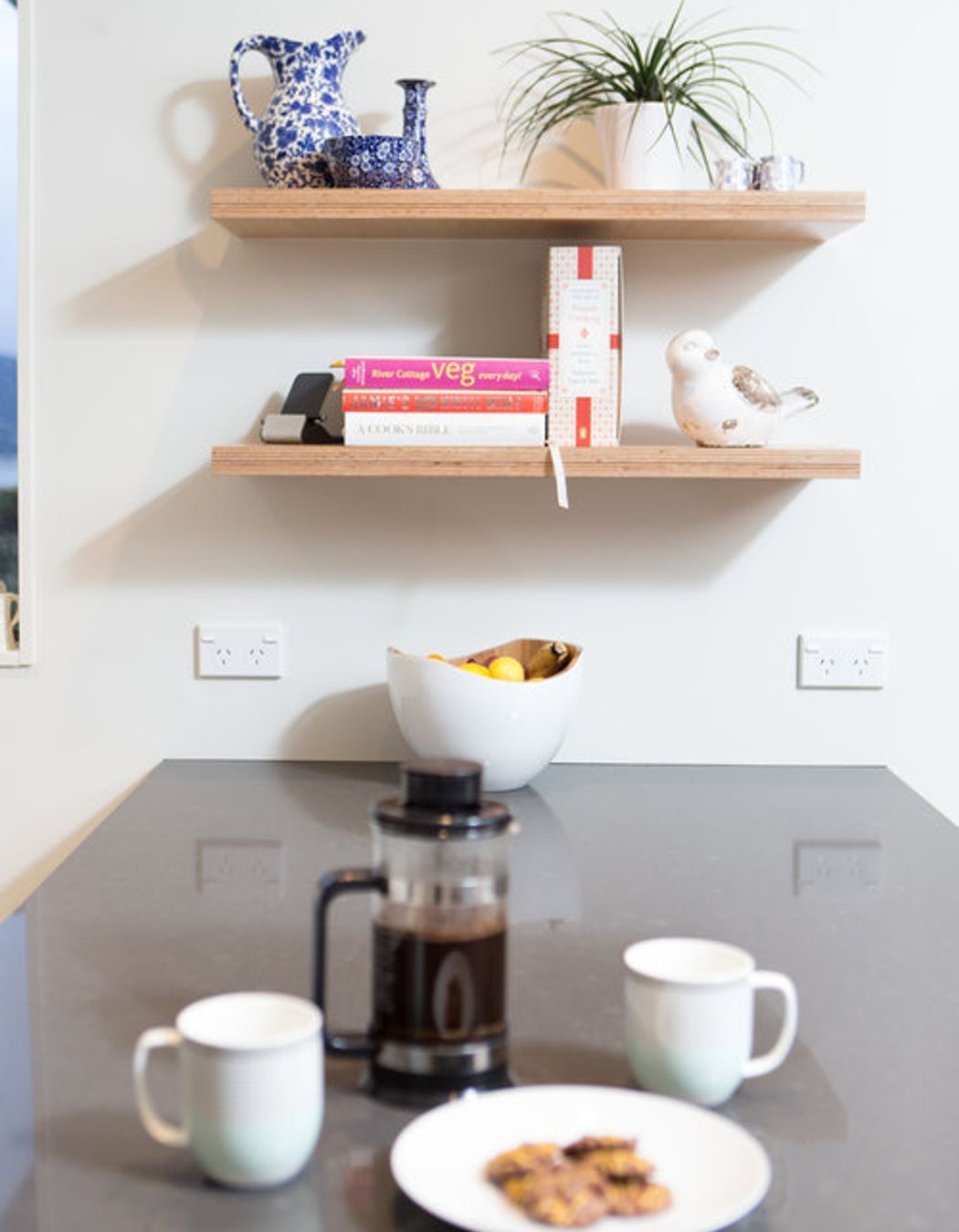 The penninsula island bench is a place to eat and gather around.