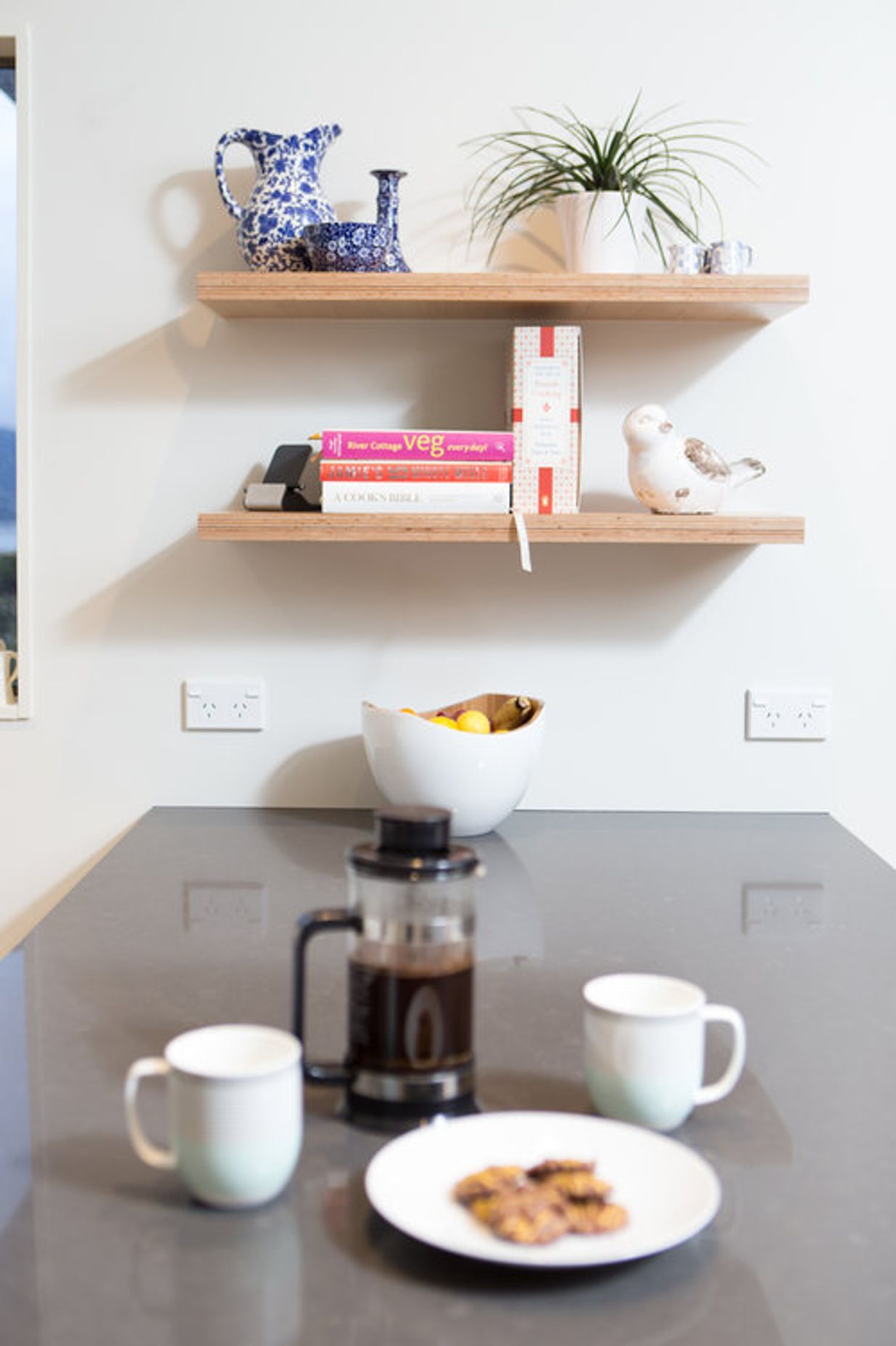 The penninsula island bench is a place to eat and gather around.