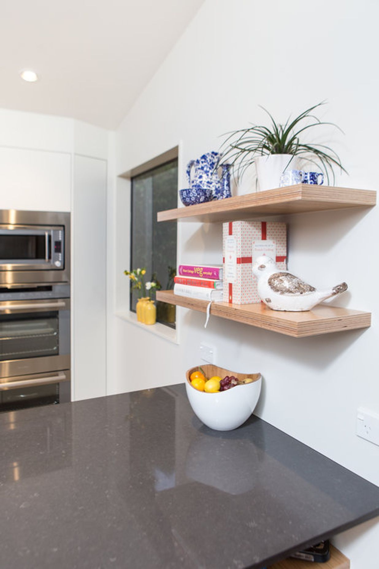 Sweet plywood display shelves above and below bench.