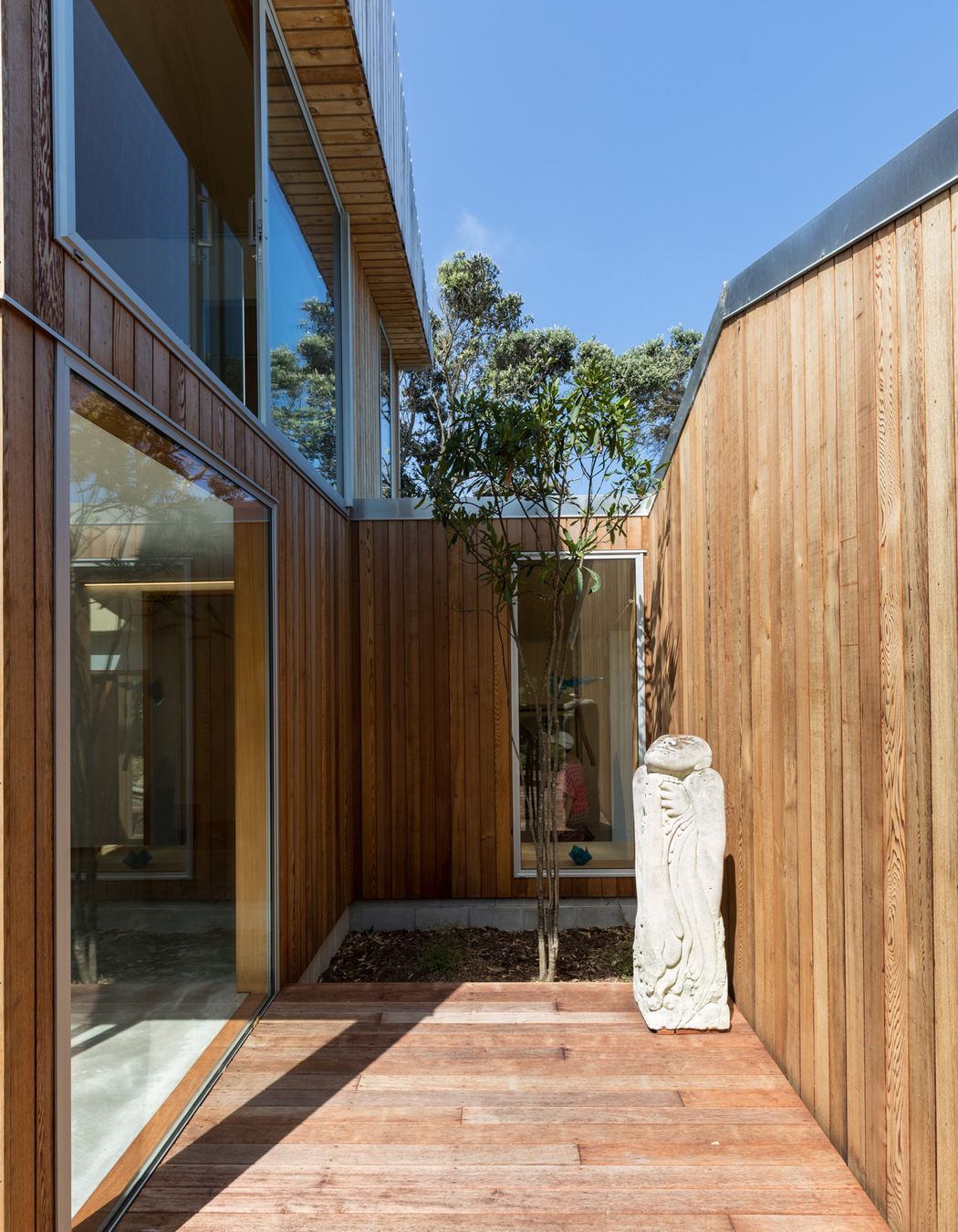 A small courtyard off the living area takes advantage of solar gain and natural ventilation.