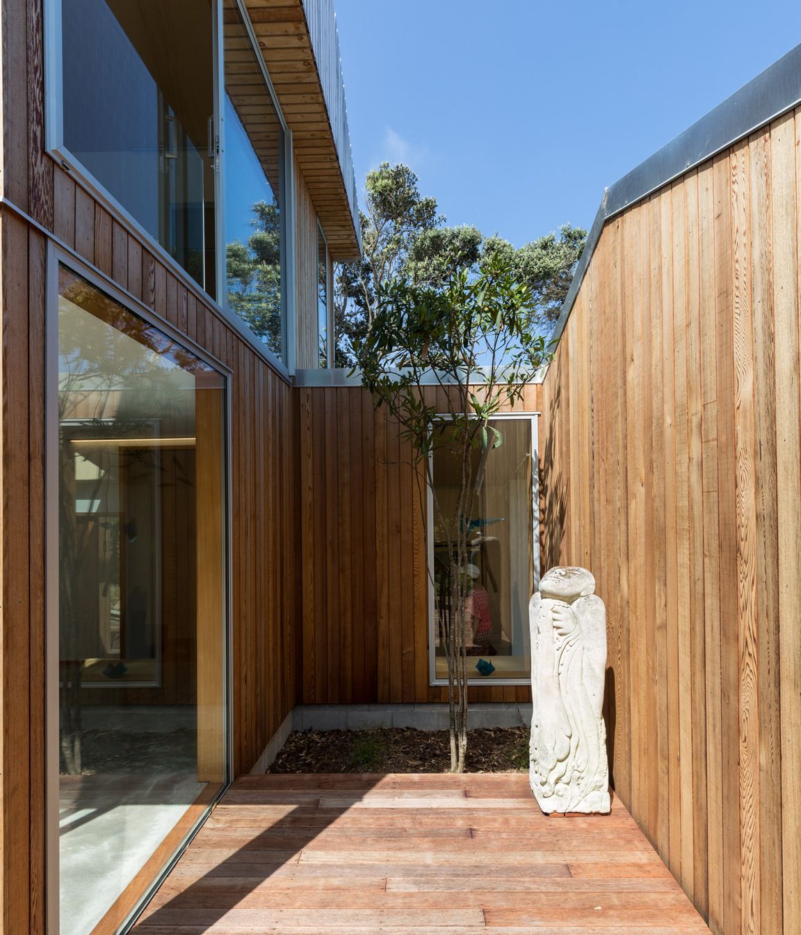 A small courtyard off the living area takes advantage of solar gain and natural ventilation.