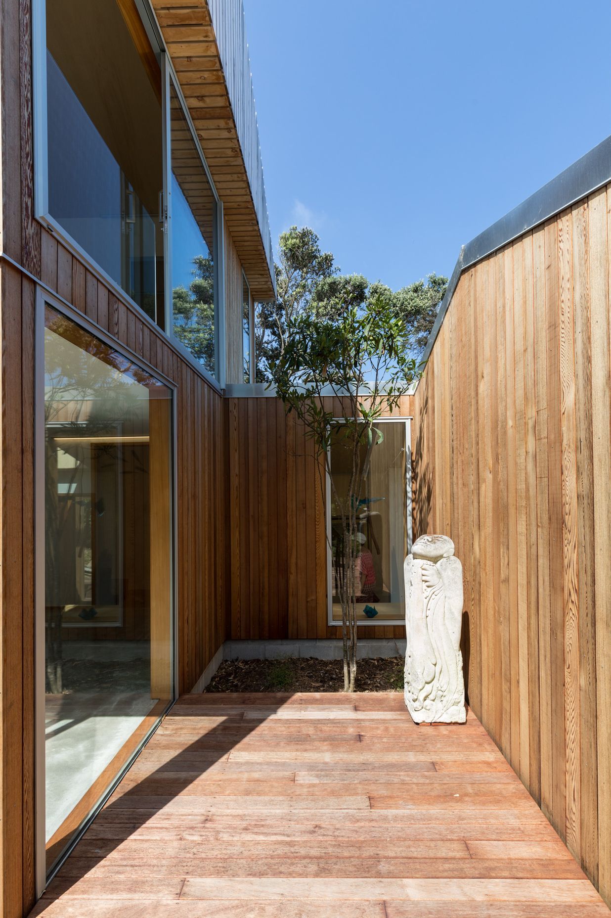 A small courtyard off the living area takes advantage of solar gain and natural ventilation.