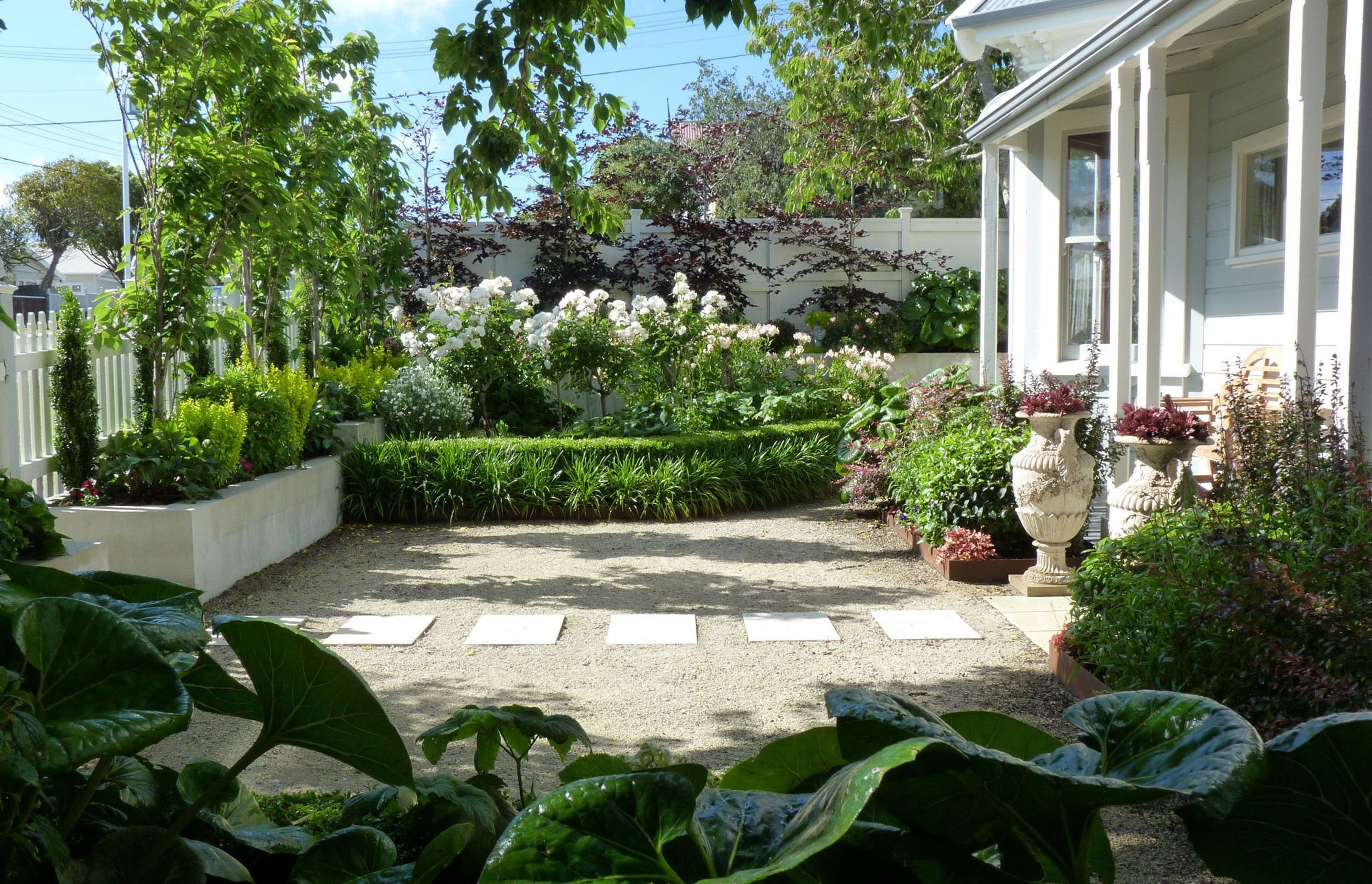 The front garden used to be a sloping lawn, and we levelled, retained, fenced and re-surfaced it.