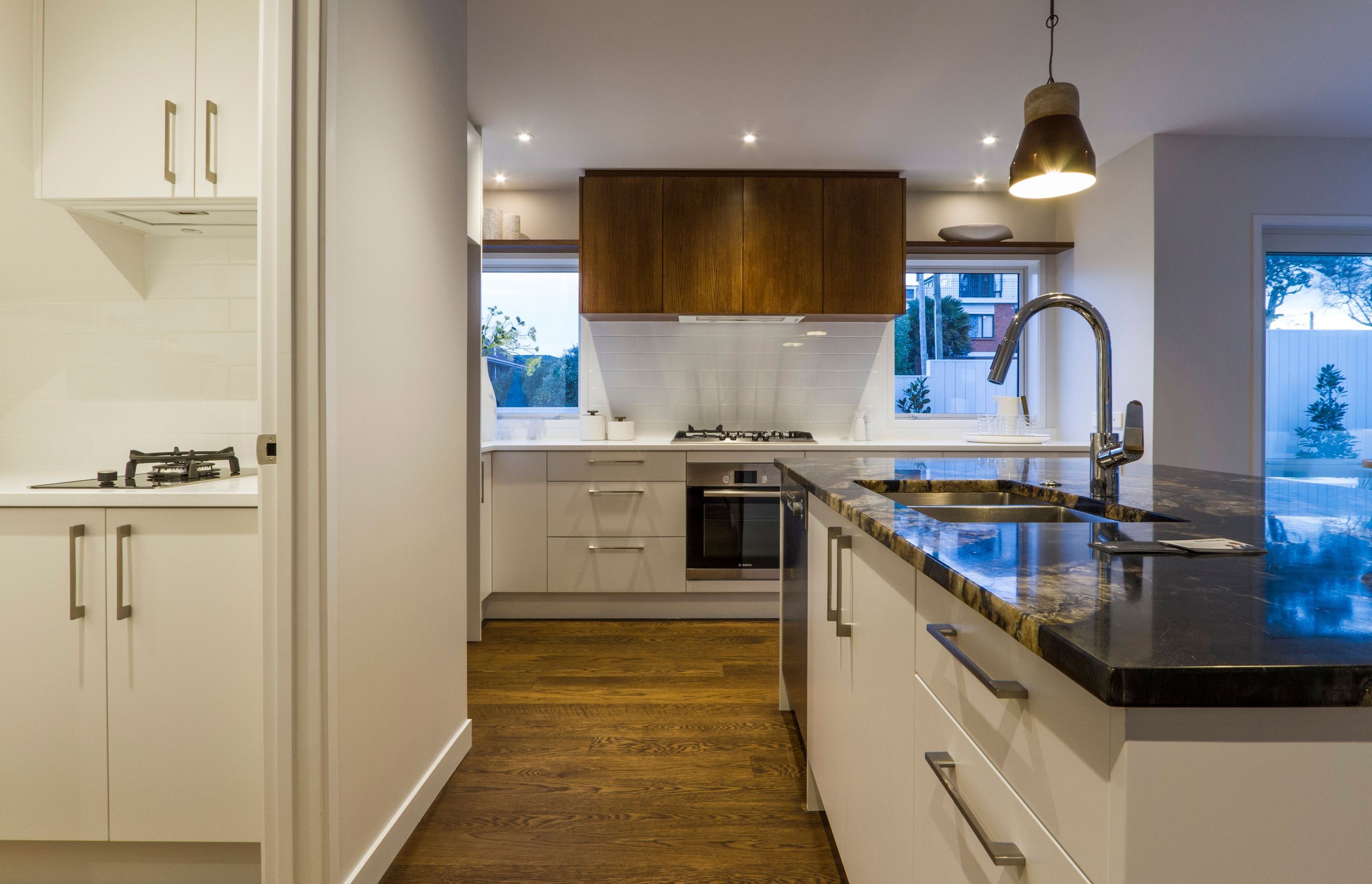 Belmont Terrace - This home was installed with Solid American White Oak flooring, finished with oil in 'Light Walnut' and Waterborne Polyurethane