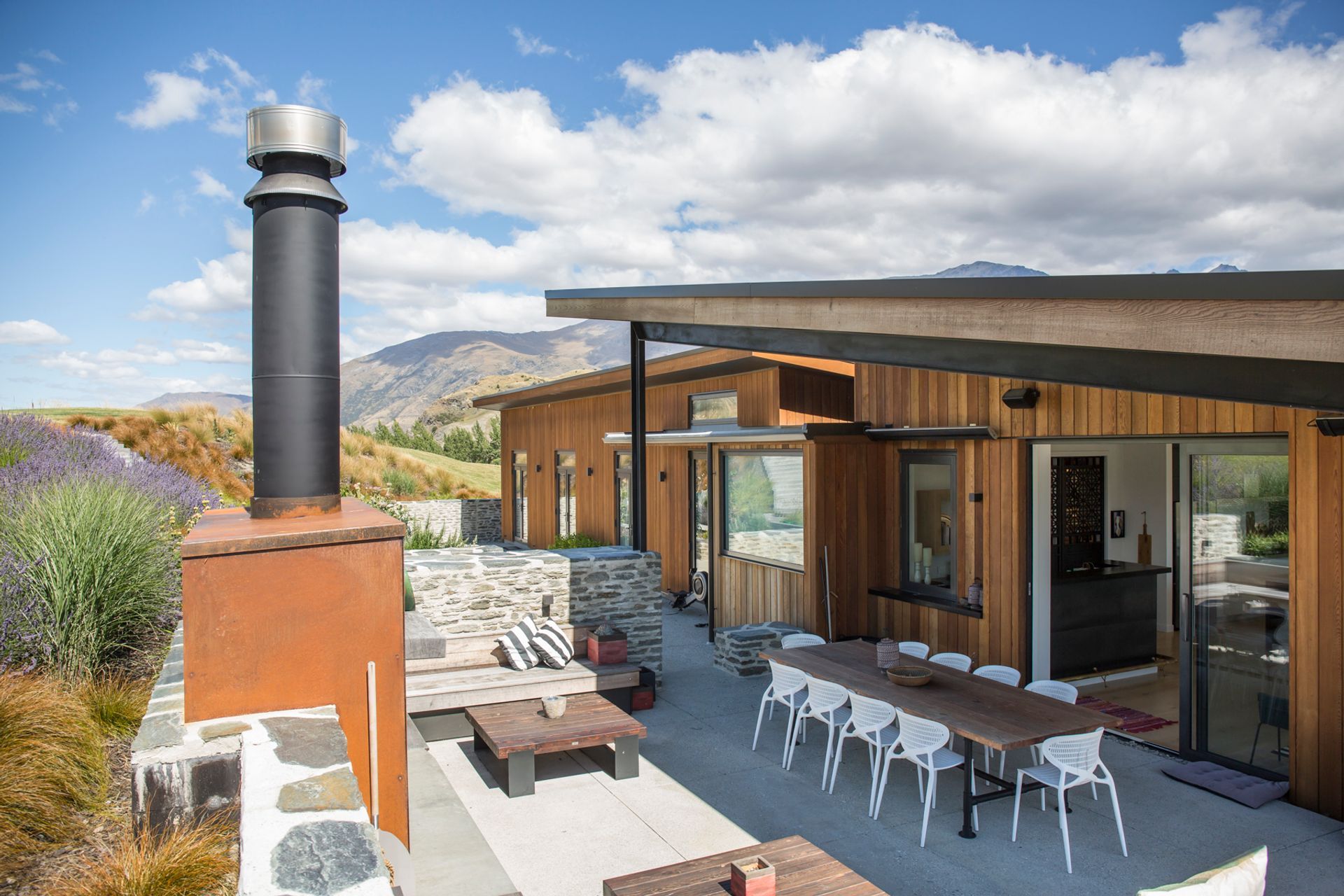 A number of outdoor areas around the house extend the living capability of the home providing the family with multiple entertaining options.