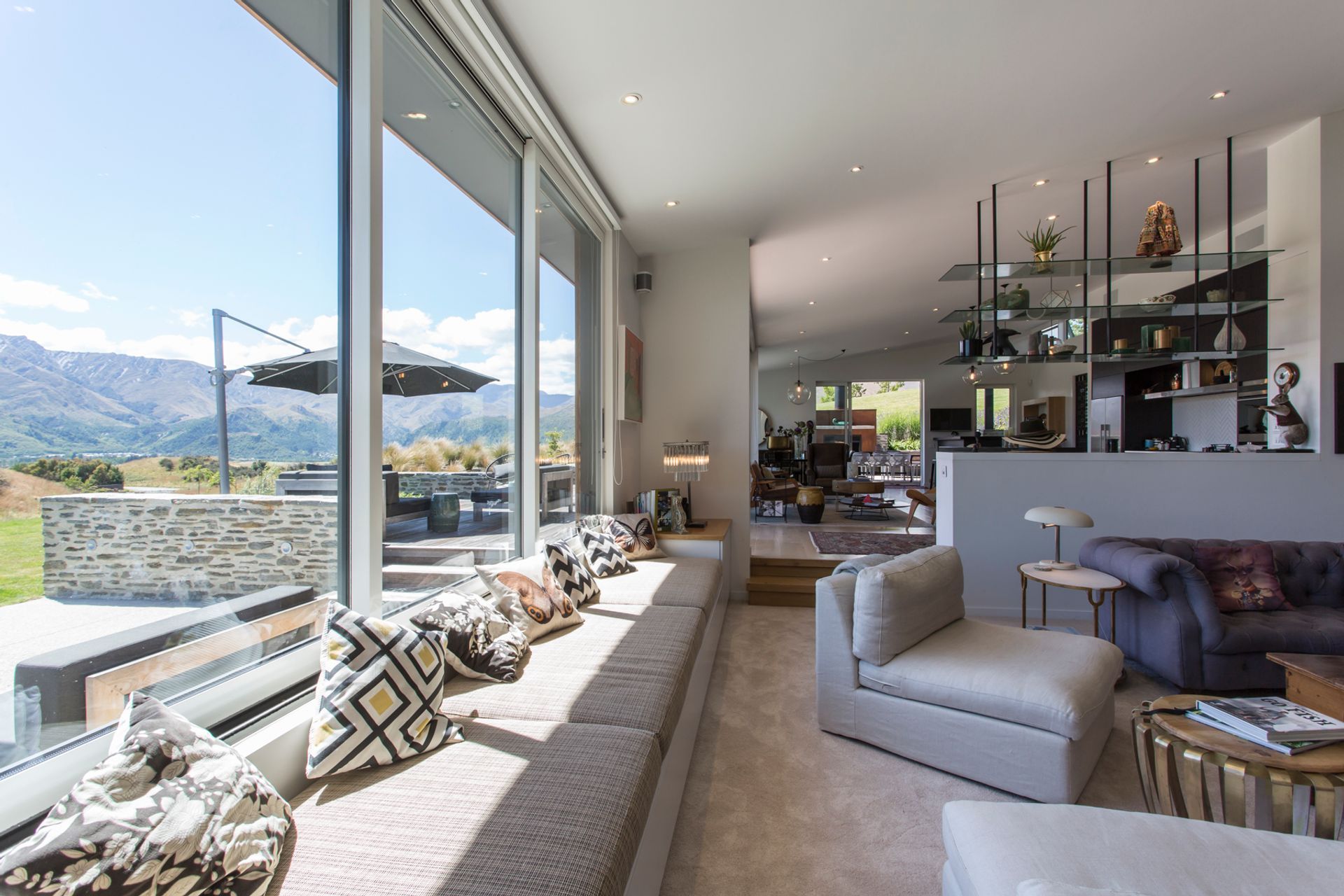 Built-in window seating was one of the requests of the owner and is found throughout the home, creating comfortable perches where the inhabitants can follow the sun throughout the day.