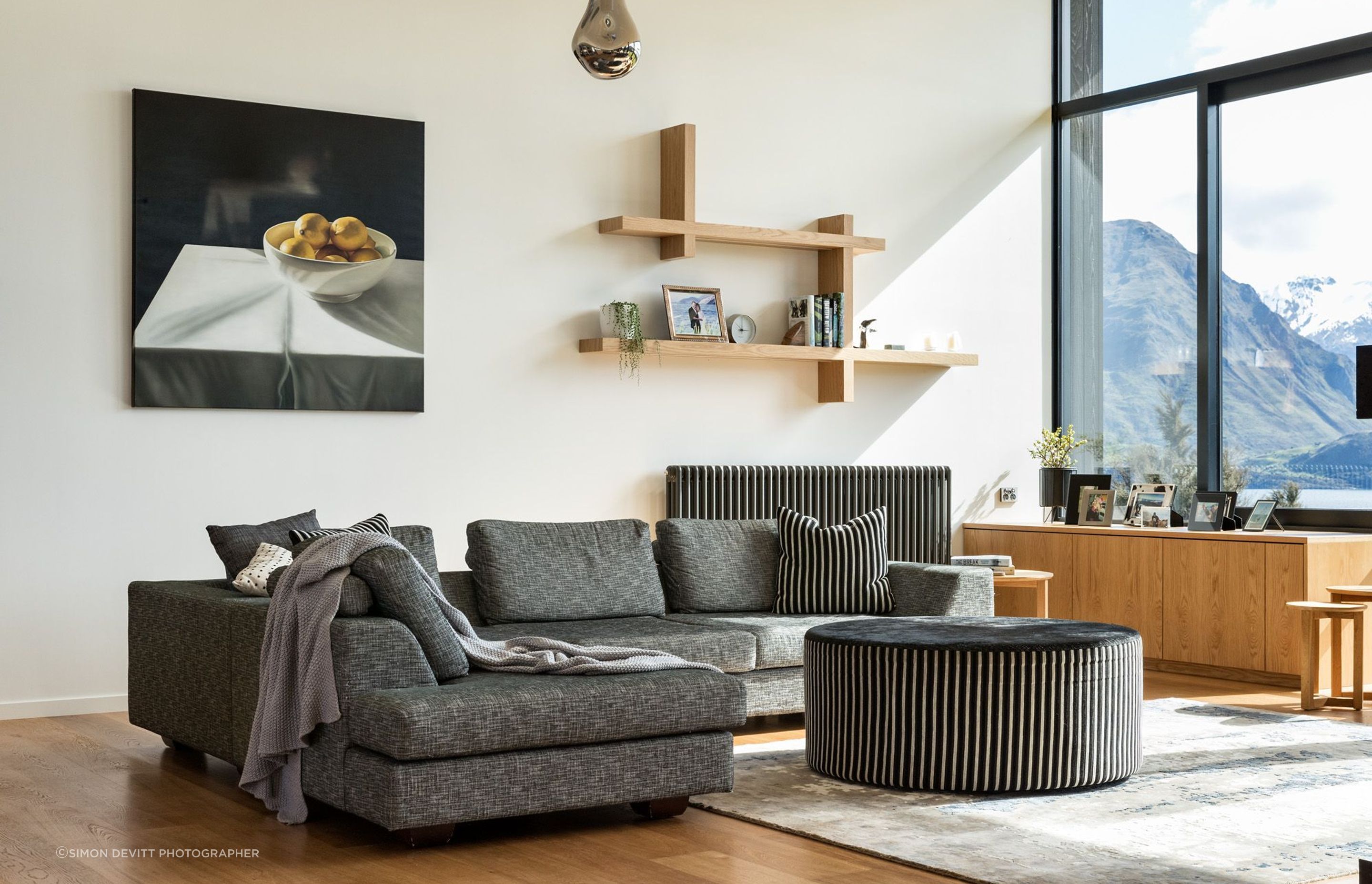  The clients wished to maximise the number of rooms with lake views to provide flow through the house suitable for a young family, seen here in the lounge area.