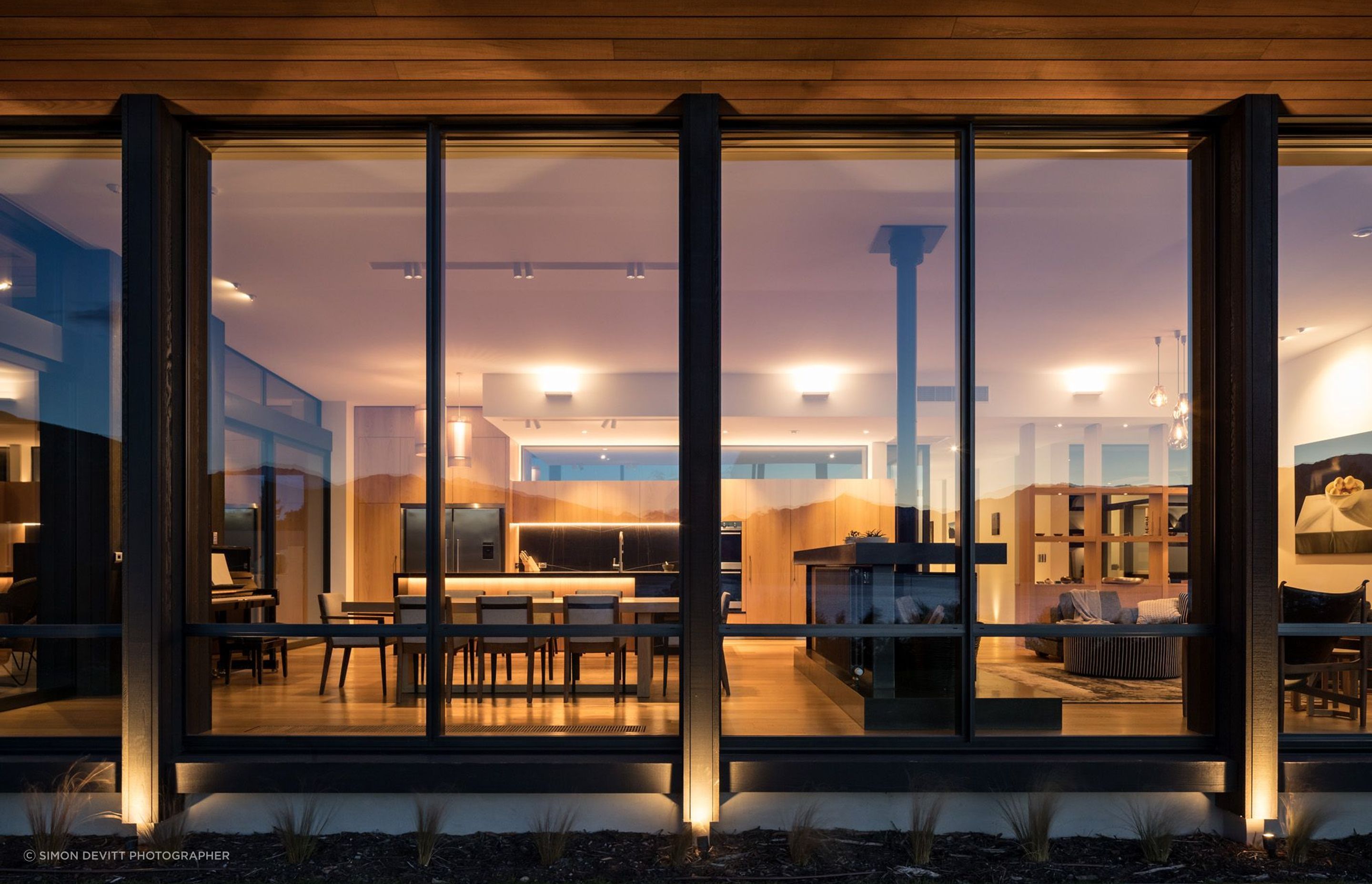 The living space lit up at night.